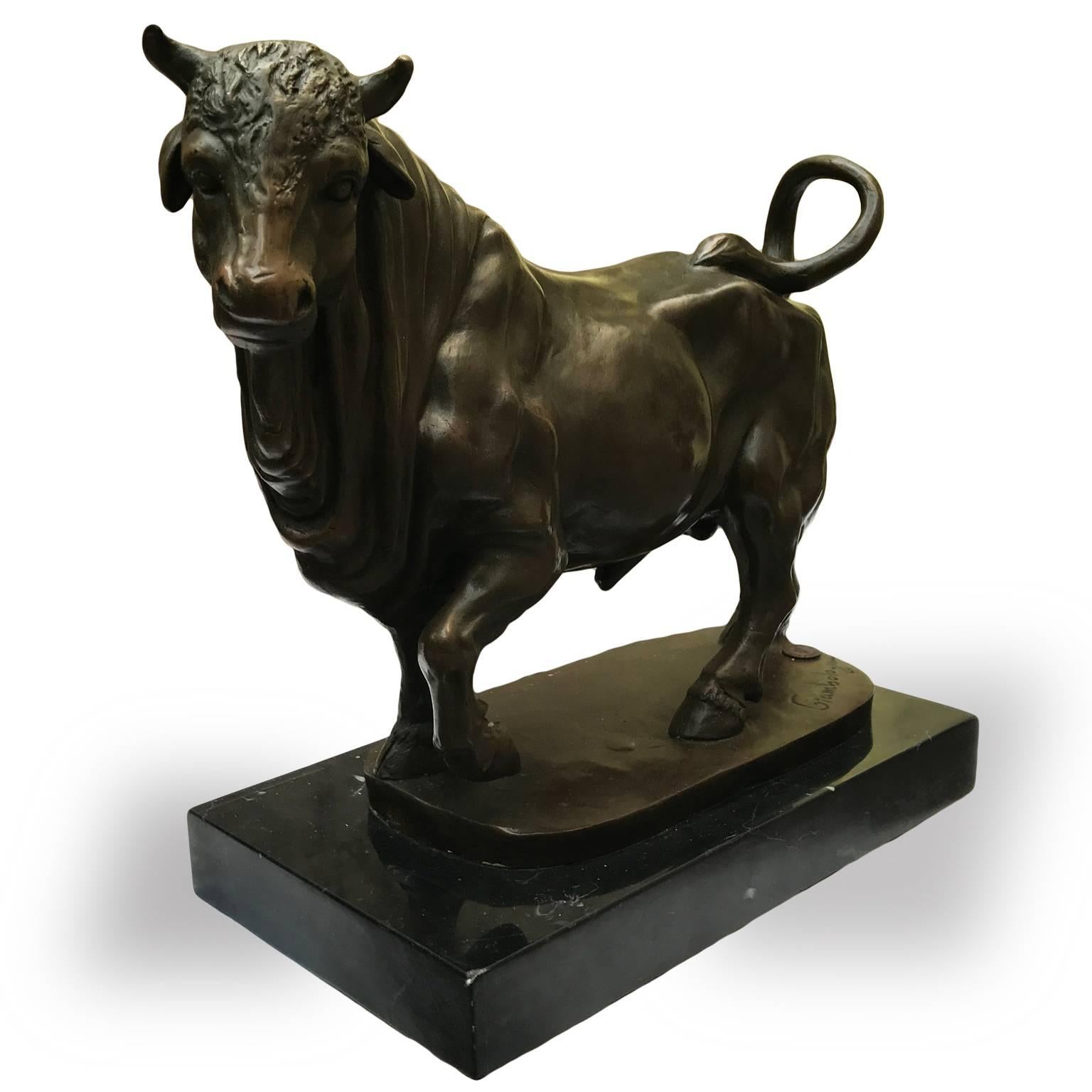 A French bronze casting sculpture of a pacing bull after Giambologna, standing with head to the left and pawing the ground with his left foreleg. Set on a rectangular black marble basement and dating back to 19th century.
Inspired by representations