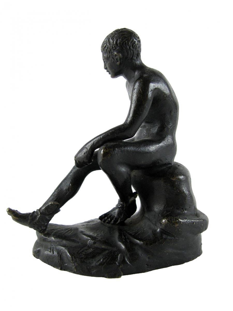 This is an excellent bronze desk-top-sized Grand Tour Souvenir figure of the resting Mercury modeled after the antique. 
Early 20th century Italian miniature bronze Mercury resting figure,  modeled as the famous seated Hermes antique sculpture