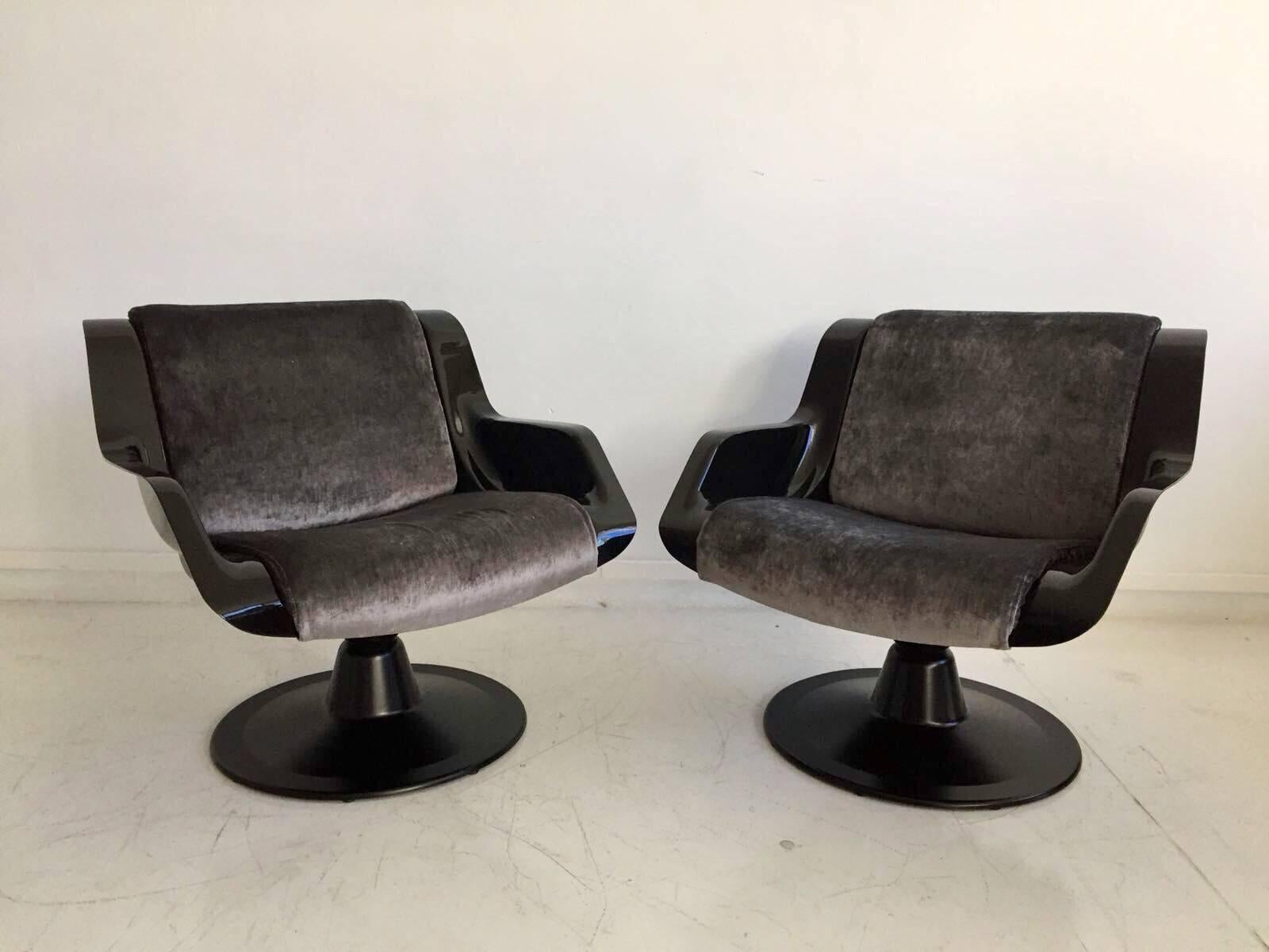 Pair of black armchairs, model 3814-1KF, by Finnish designer Yrjo Kukkapuro, produced by Haimi Finland, circa late 1960s. Seat shells made of black ABS plastic, newly upholstered with dark grey velvet fabric, aluminum rotation base. These chairs