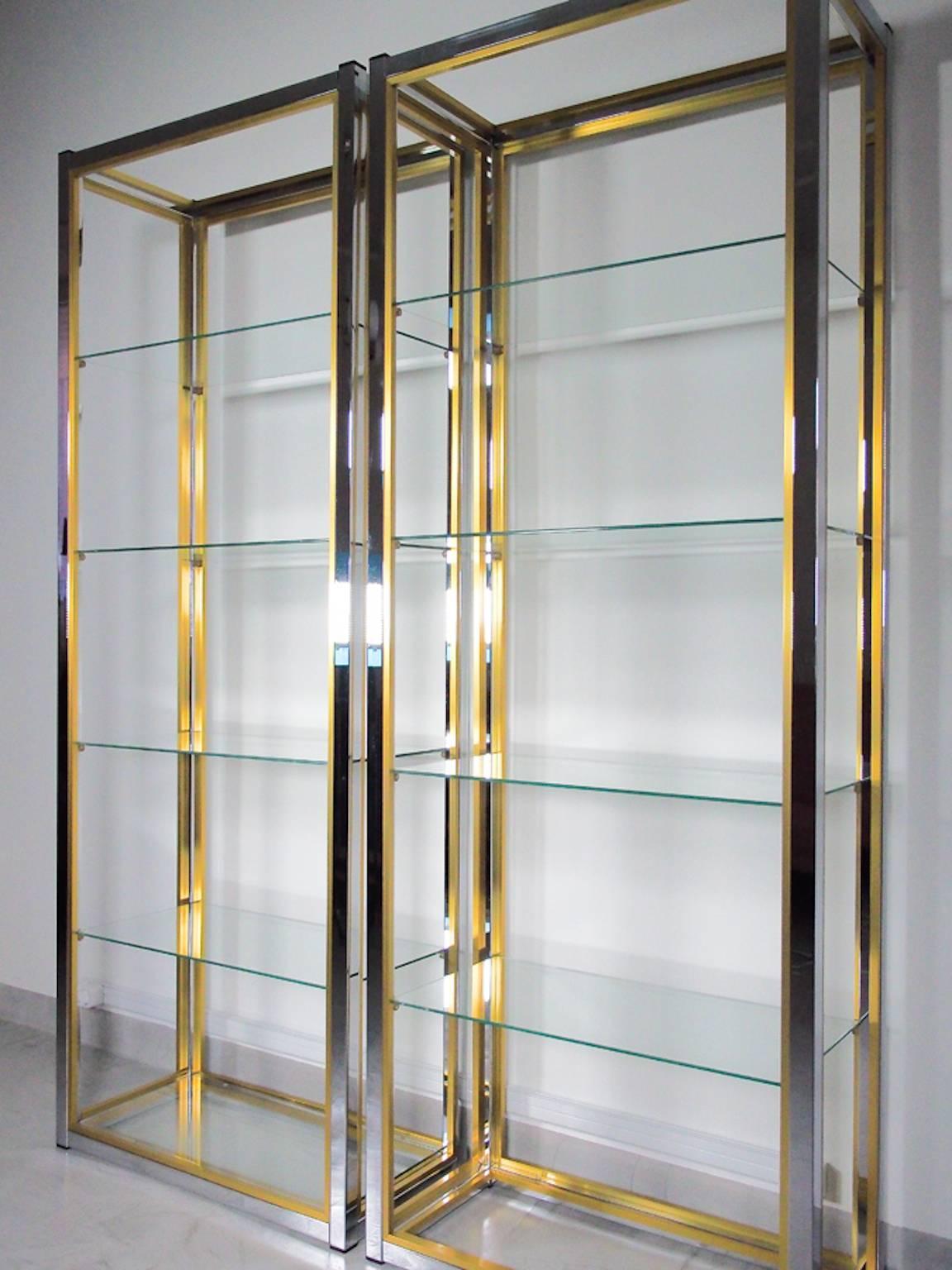 Pair of polished chrome and glass shelves by Italian designer Renato Zevi. Elegant étagère that can be used as a room divider. Shelves made of glass.