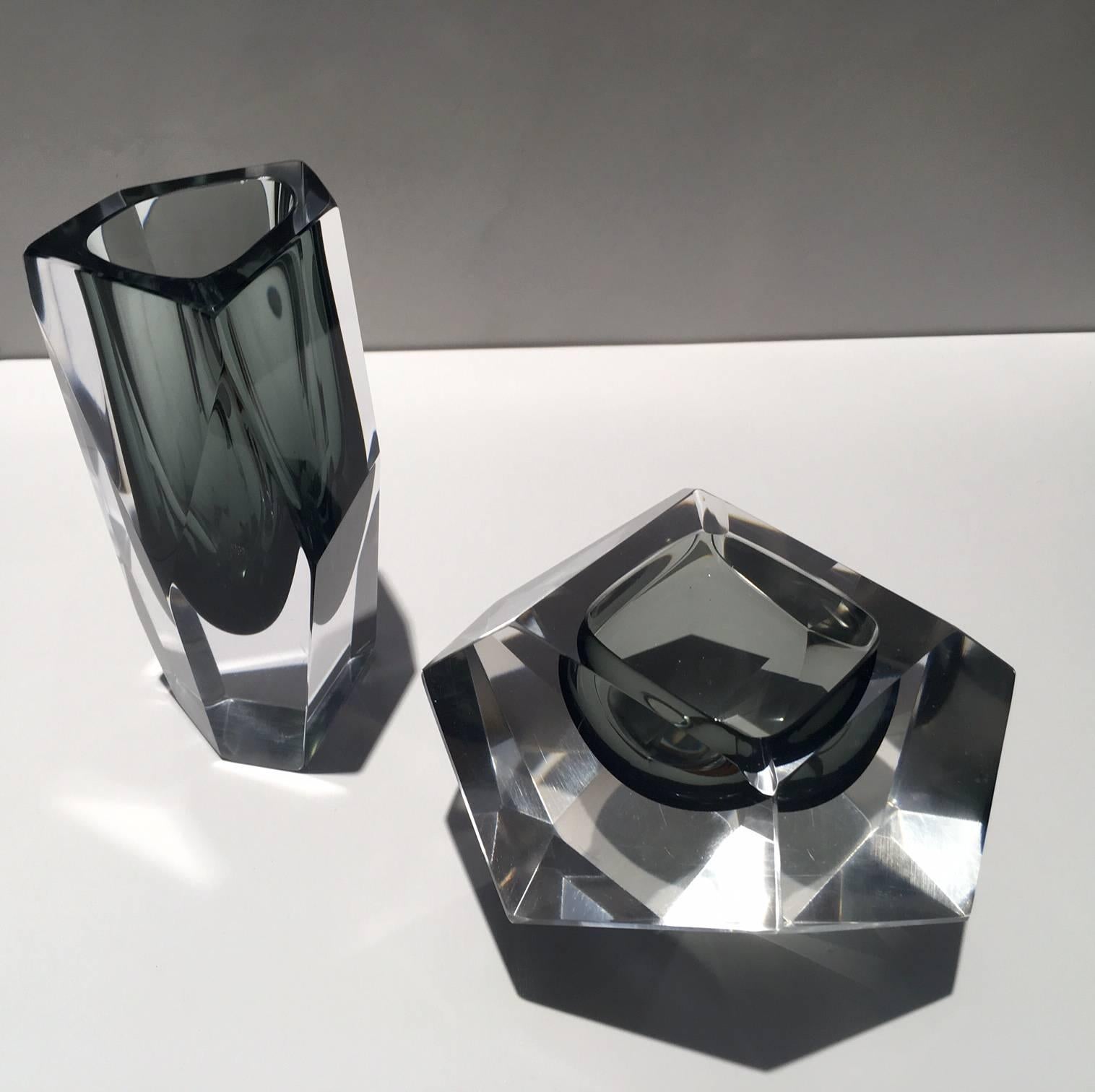 Stunning set of Italian Murano glass pieces attributed to Flavio Poli (1900-1984). Set of vase and a diamond-shaped bowl/ashtray. Faceted sides and a gorgeous color combination of black and grey. These pieces shine beautifully as they capture the