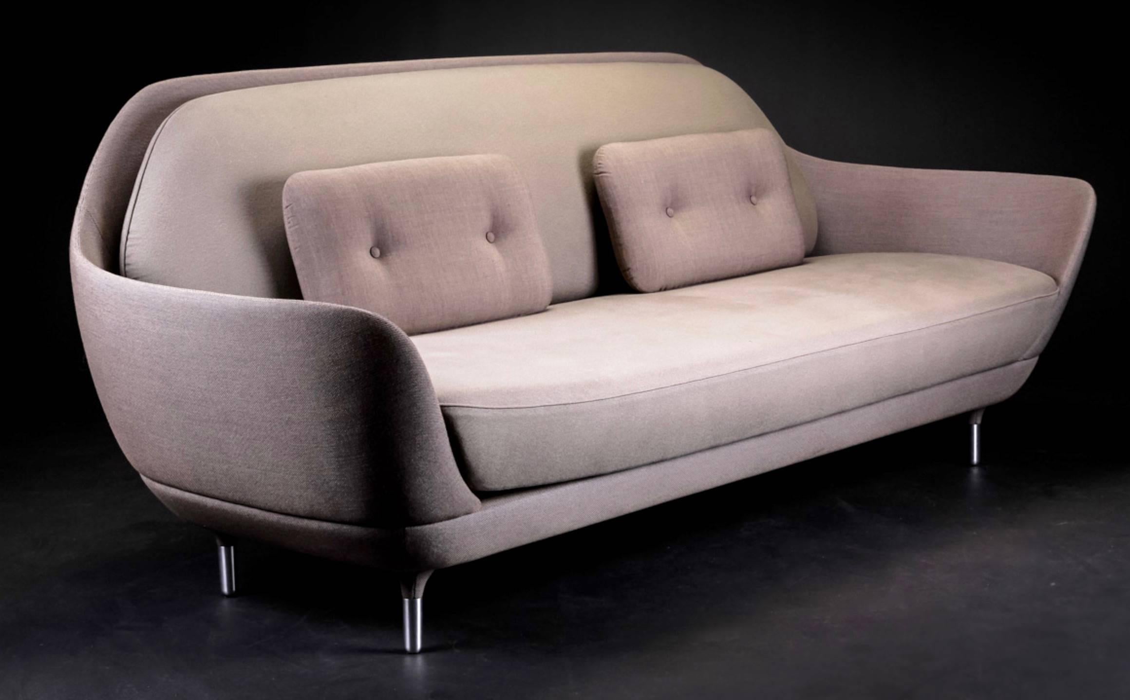 Meaning "to embrace" in Danish, the favn three-seat sofa is designed by Jaime Hayón. Upholstered with light and dark grey fabrics. Loose cushions, brushed aluminium legs. Very comfortable and elegant sofa, interior cushioning made of