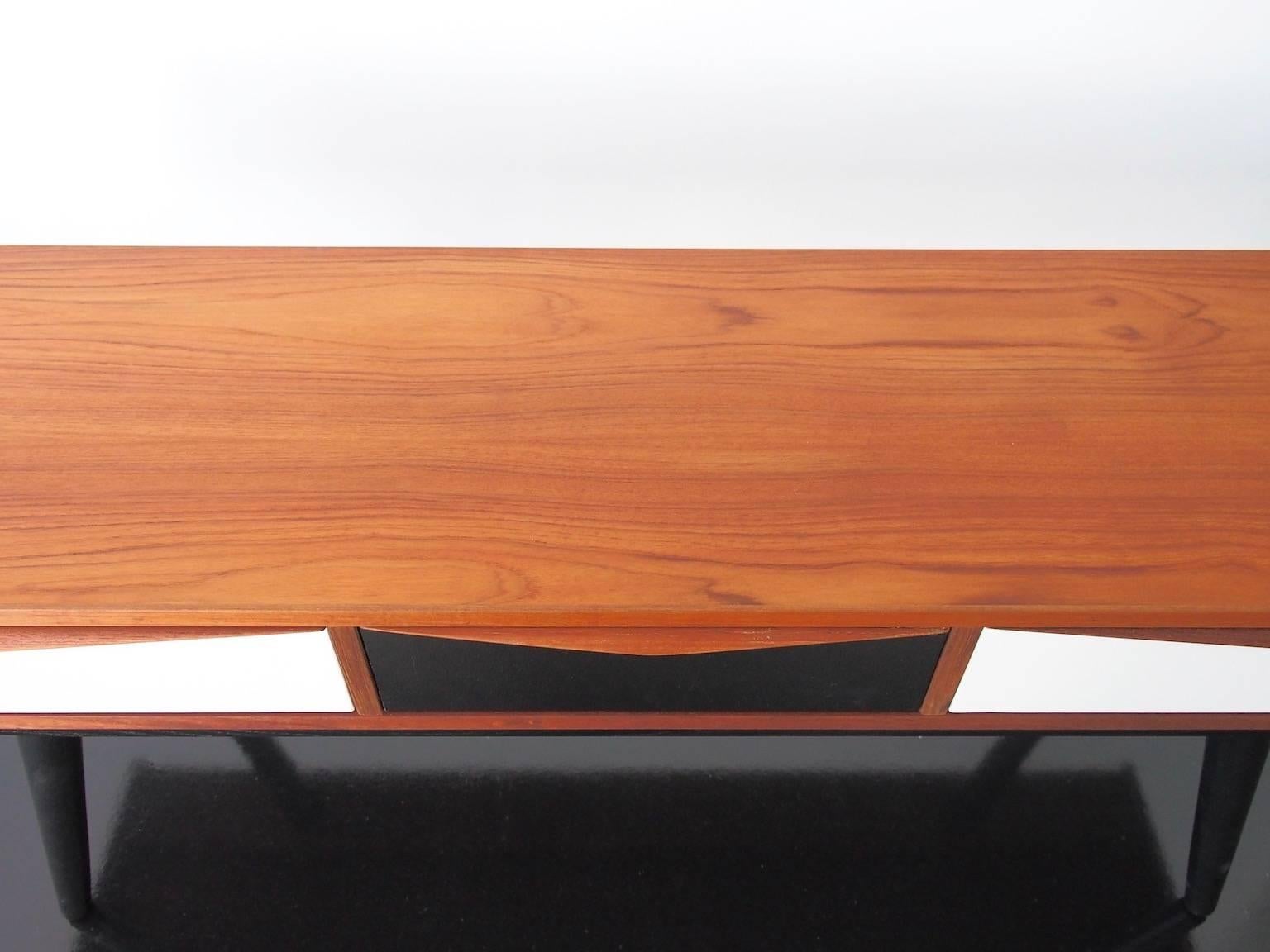 Danish Low Teak Console with Black and White Drawers by Svend Erik Andersen
