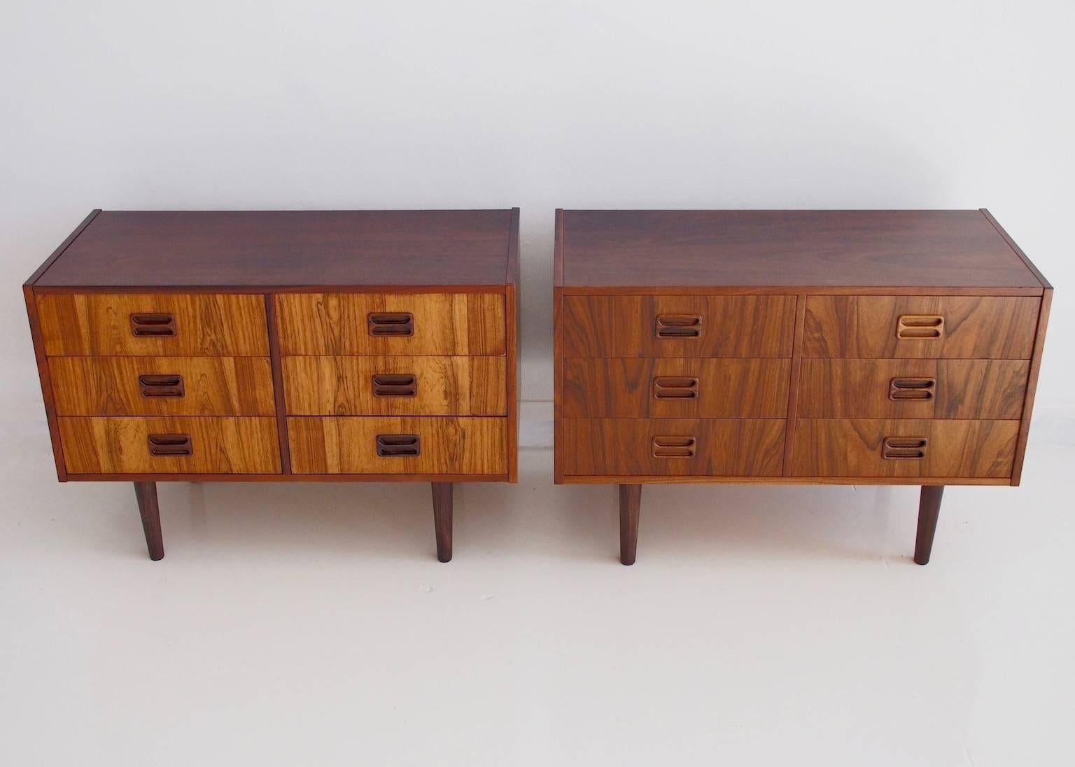 Two sideboards or commodes in slightly different color, veneered with rosewood. Front with six drawers, later mounted unoriginal legs. Recently restored, very good condition.