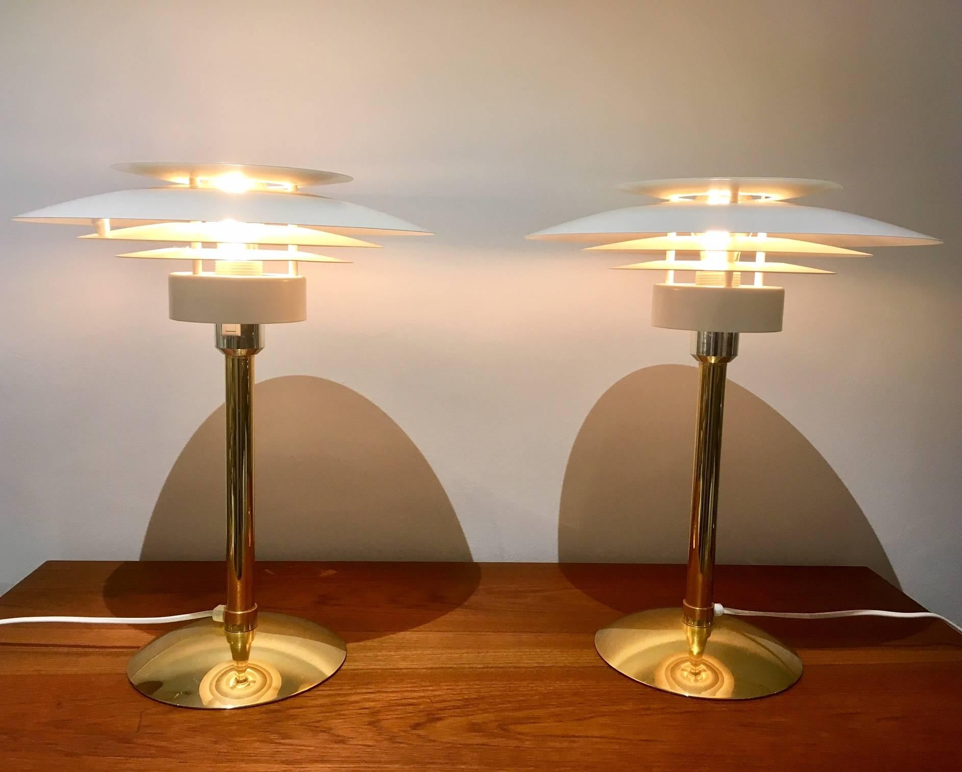 Two table lamps, model 2687, manufactured by Light Studio by Horn. Brass and chrome-plated metal, shades of white painted metal.