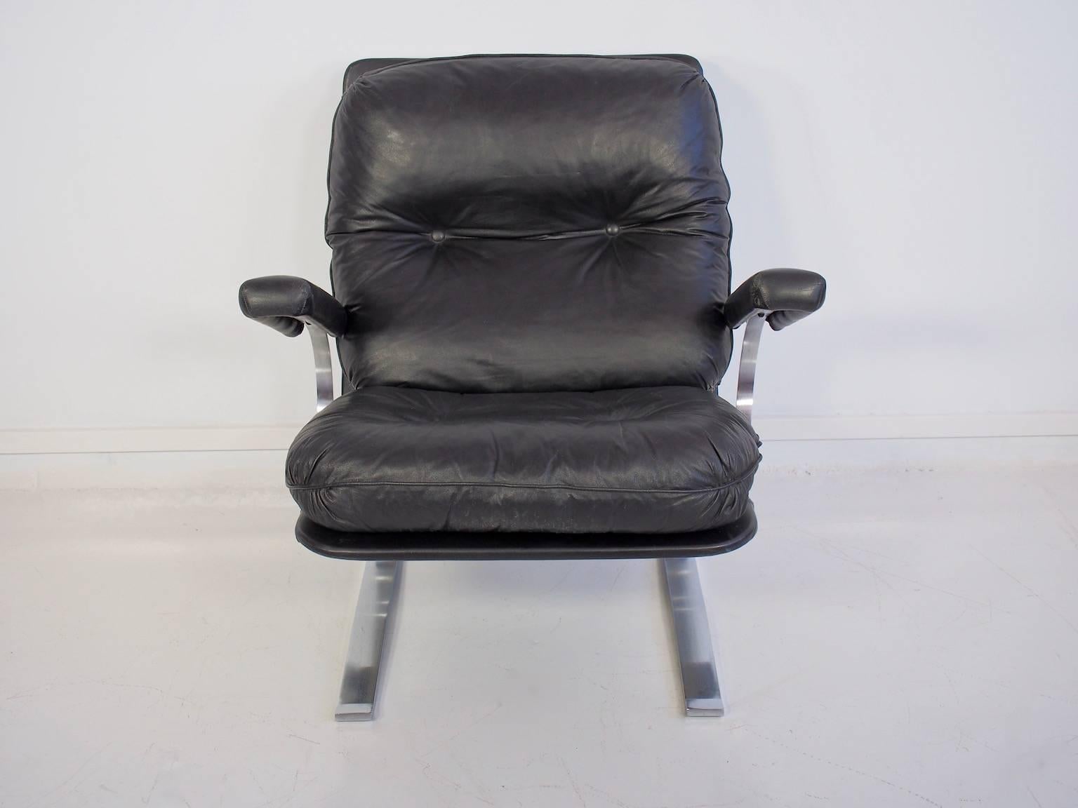 Mid-Century leather armchair. Soft black leather and chrome steel armchair with detachable cushions. Very comfortable.