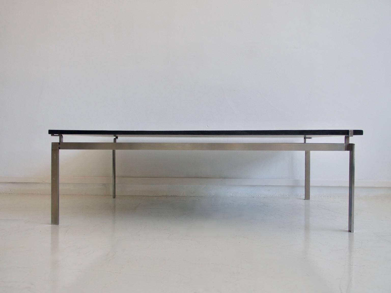 Large coffee table in the style of Poul Kjaerholm, 1960s-1970s. Construction of chromium-plated steel frame and loose black slate table top treated with oil.