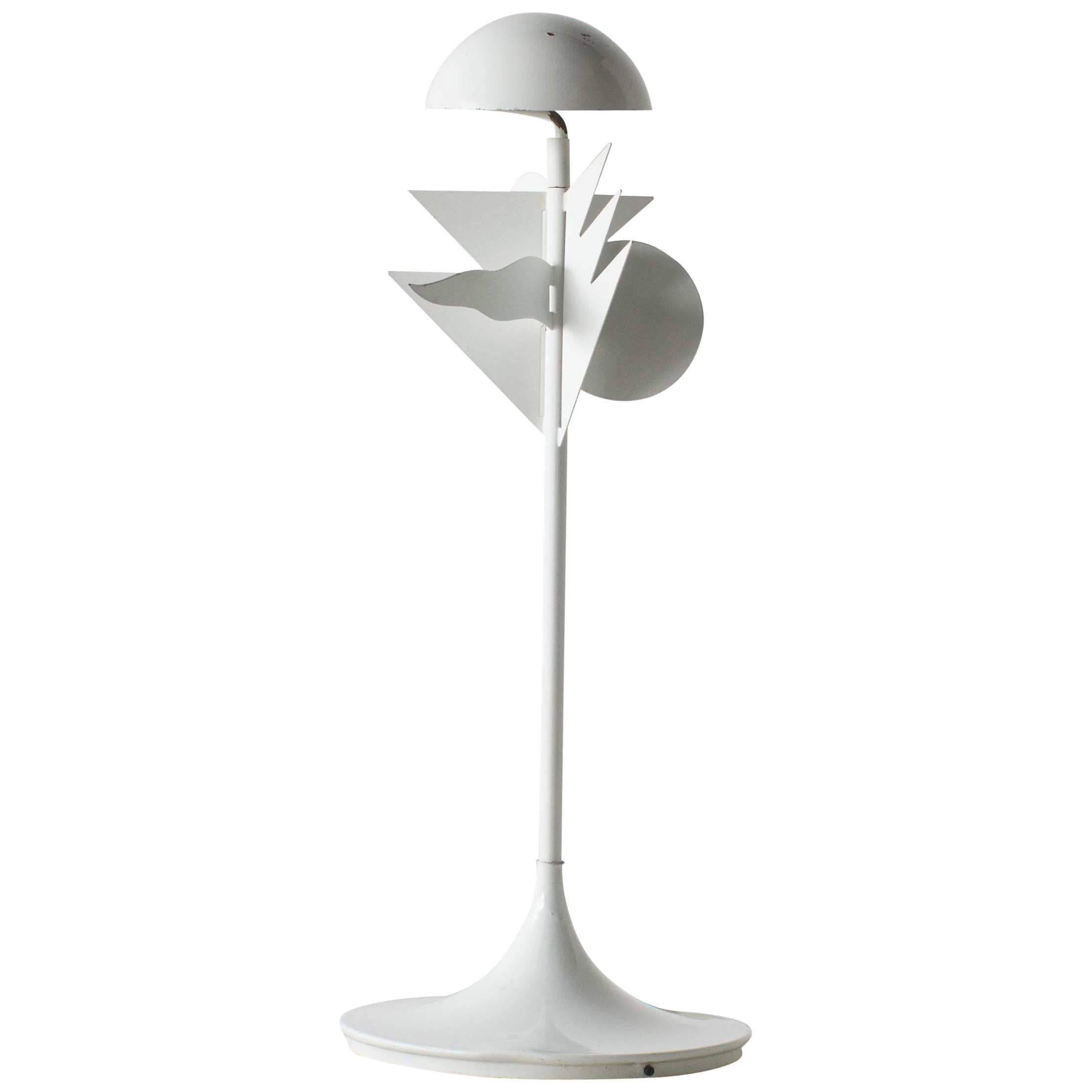 Papalina floor lamp. Alessandro Mendini Designed in 1983 for Eleusi.
Hard to find lamp. You can find repeated using motiff like a group of flags by Mendini.
Table lamp model is available too.