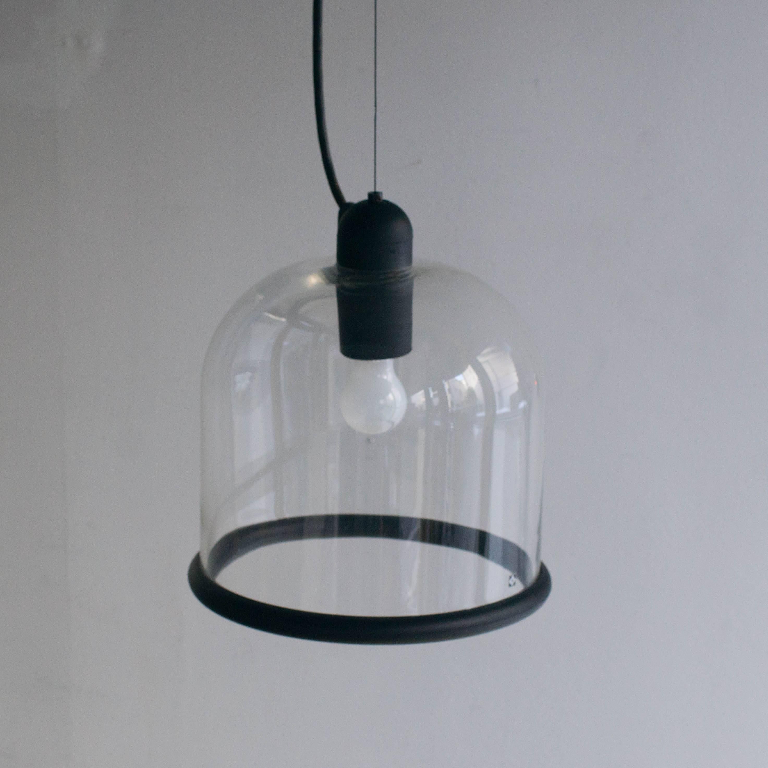 Domani pendant lamp designed by Masayuki Kurokawa for Yamagiwa. Made of glass with rubber lim. Clear glass shade.
E26 bulb.