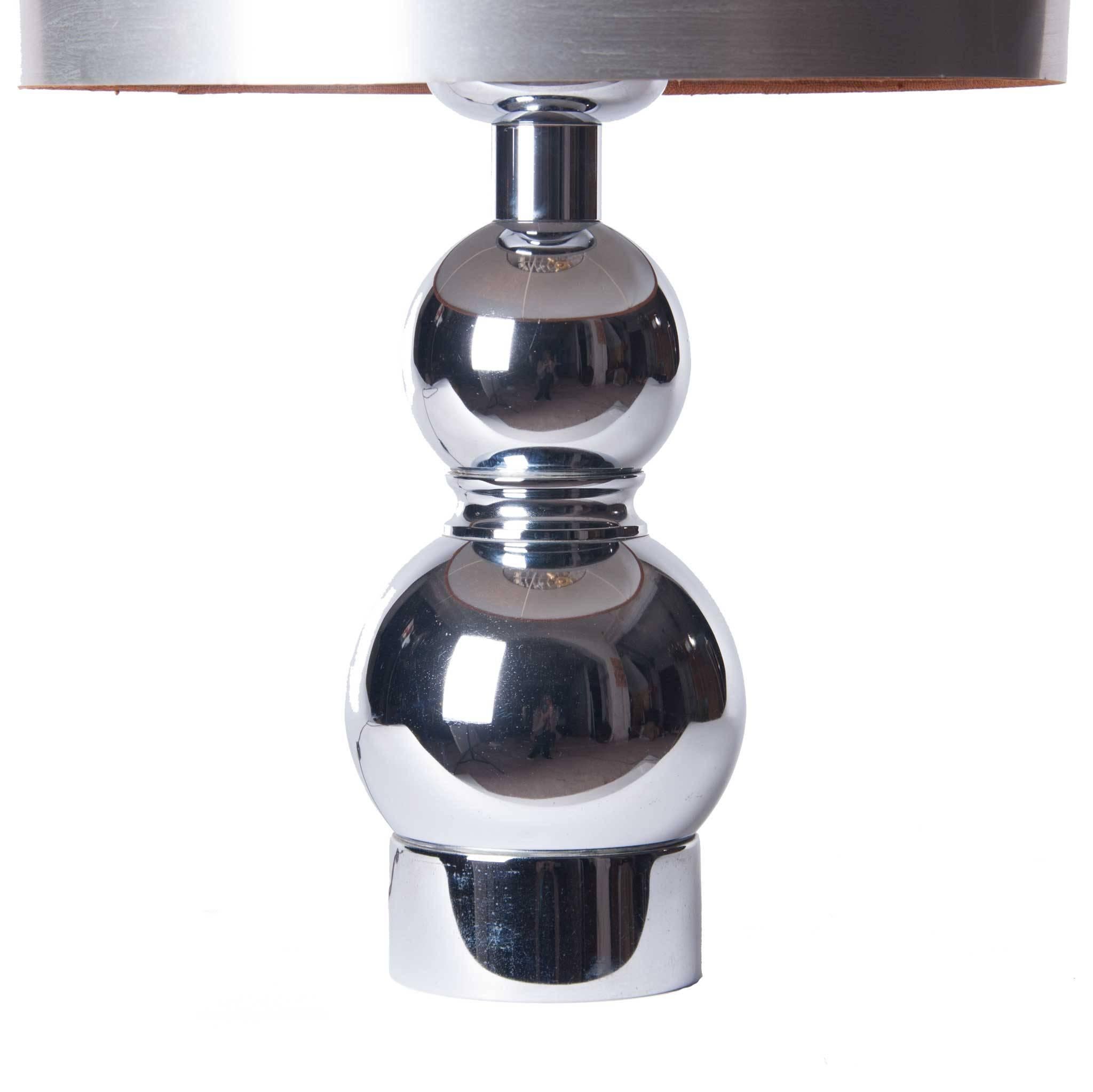Stunning table lamp with chrome stand. Over the years the shade on the photo is no longer what it used to be. 