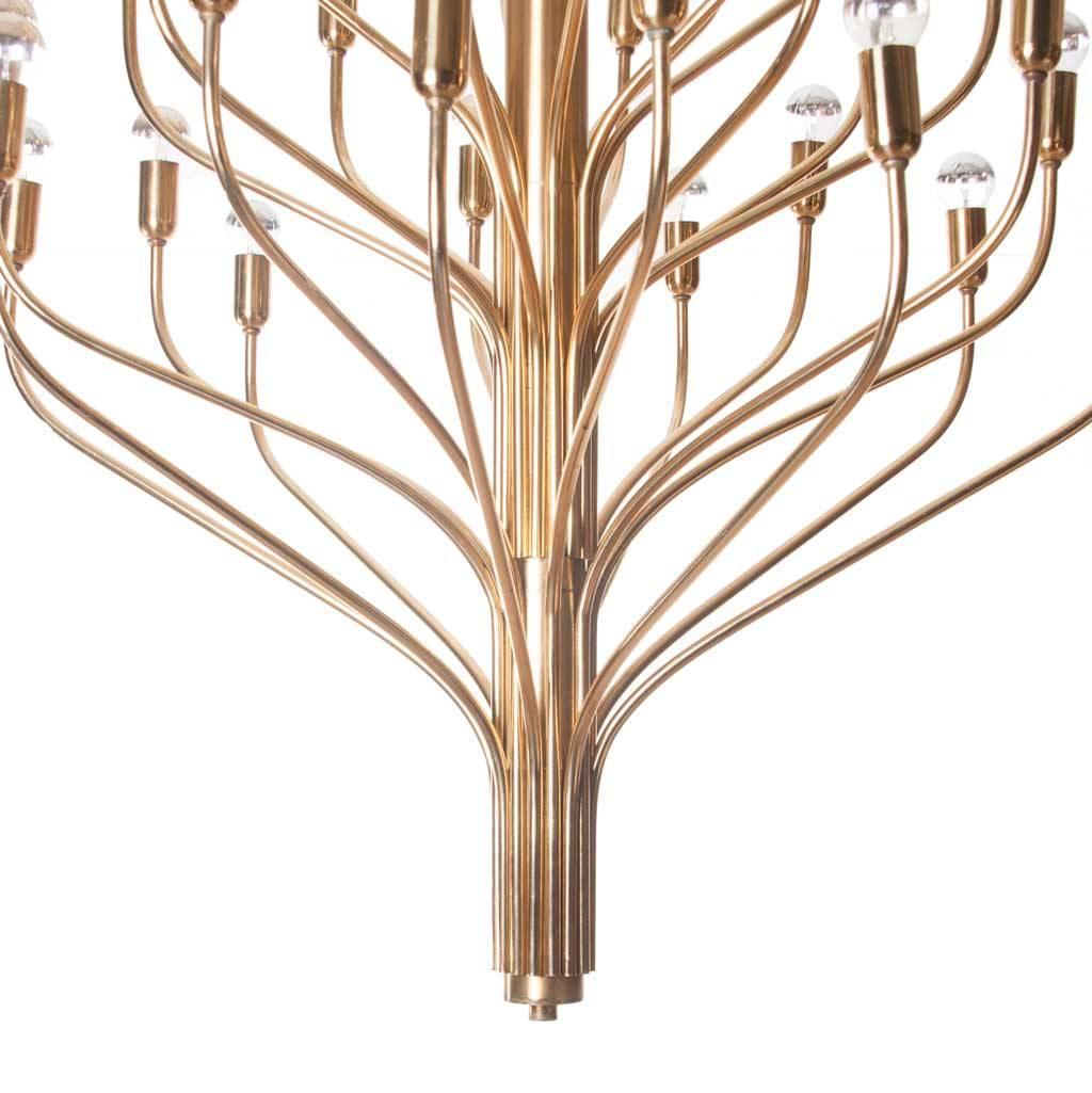 Stunning large chandeliers with 32 lights coming from each stem. Three in stock. 