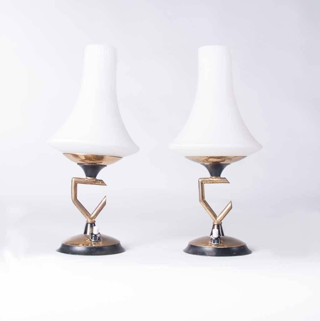 Petite table lamps with conical glass shades and brass and lacquered frame. Attributed to Stilnovo.