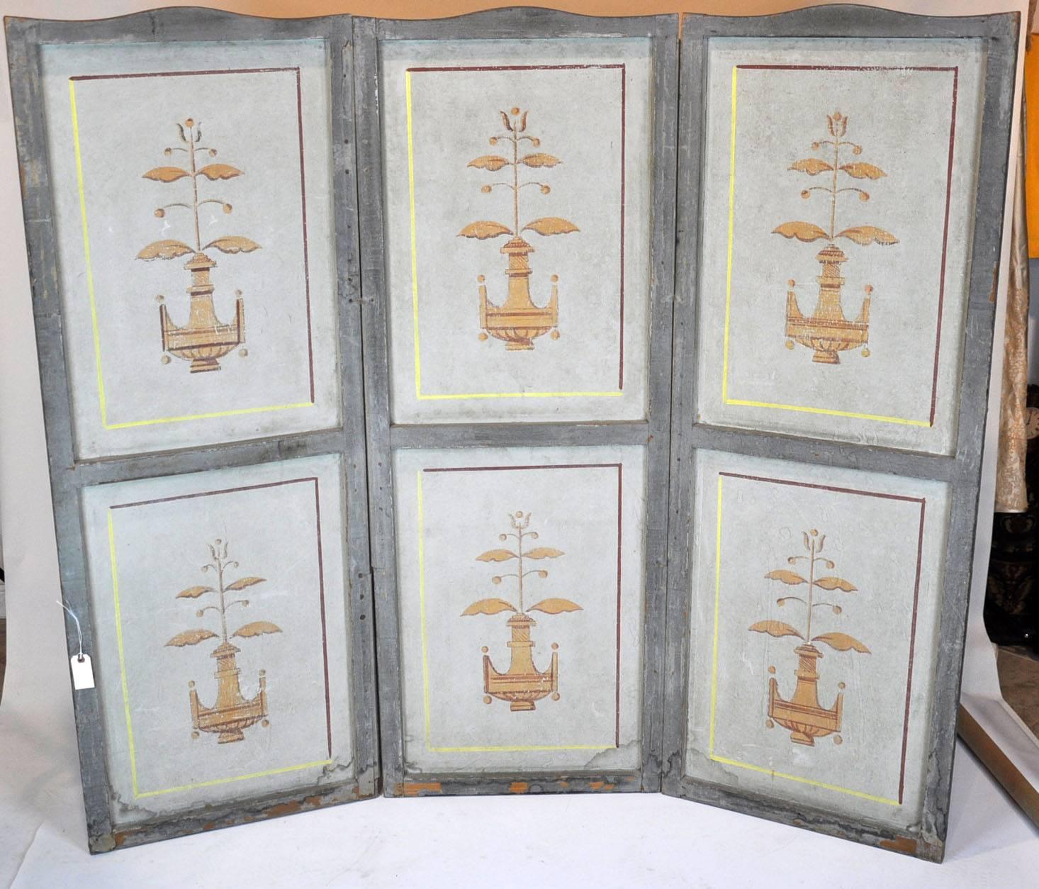 Three-panel painted French screen. Painted on both sides. Early 19th century. Some paint loss.