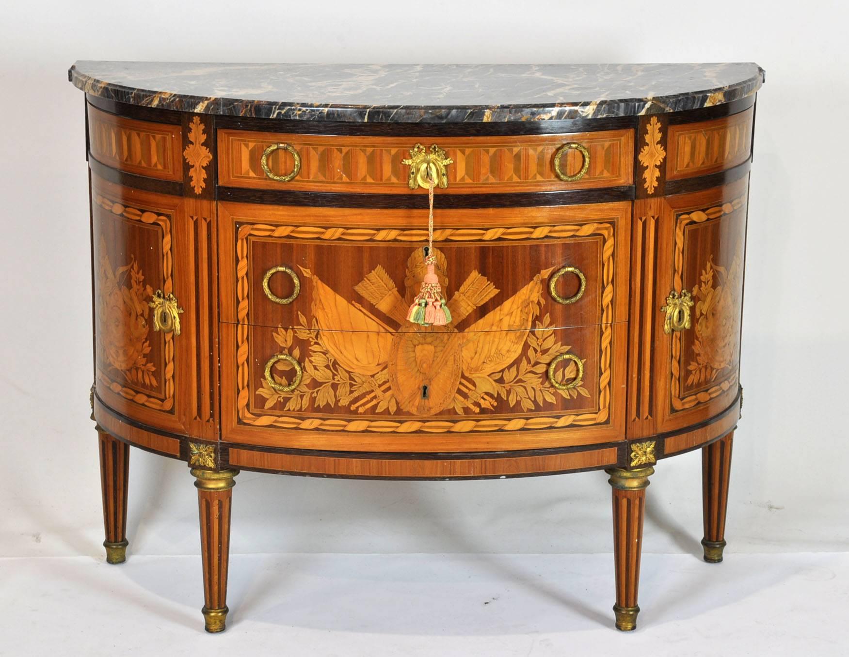 Inlaid demilune cabinets from the mid-20th century. Bronze mounts. Very well made. Made in Portugal by the Foundation Ricardo Do Espirito Santo Silva using centuries-old mystery and traditions. Stamped on top.