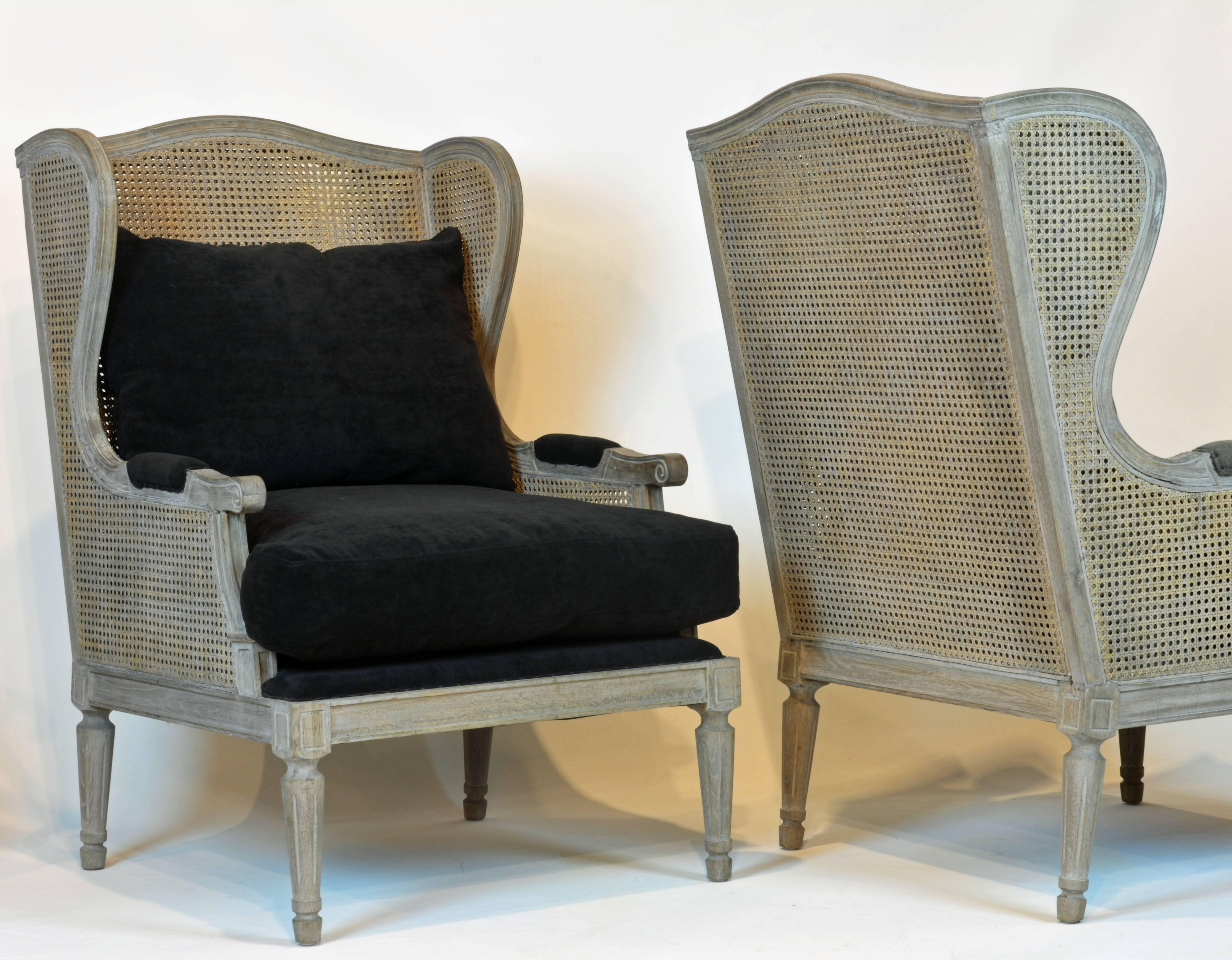 Pair of Tasteful Vintage French Style Double Caned Grey Painted Carved Bergeres In Good Condition In Ft. Lauderdale, FL