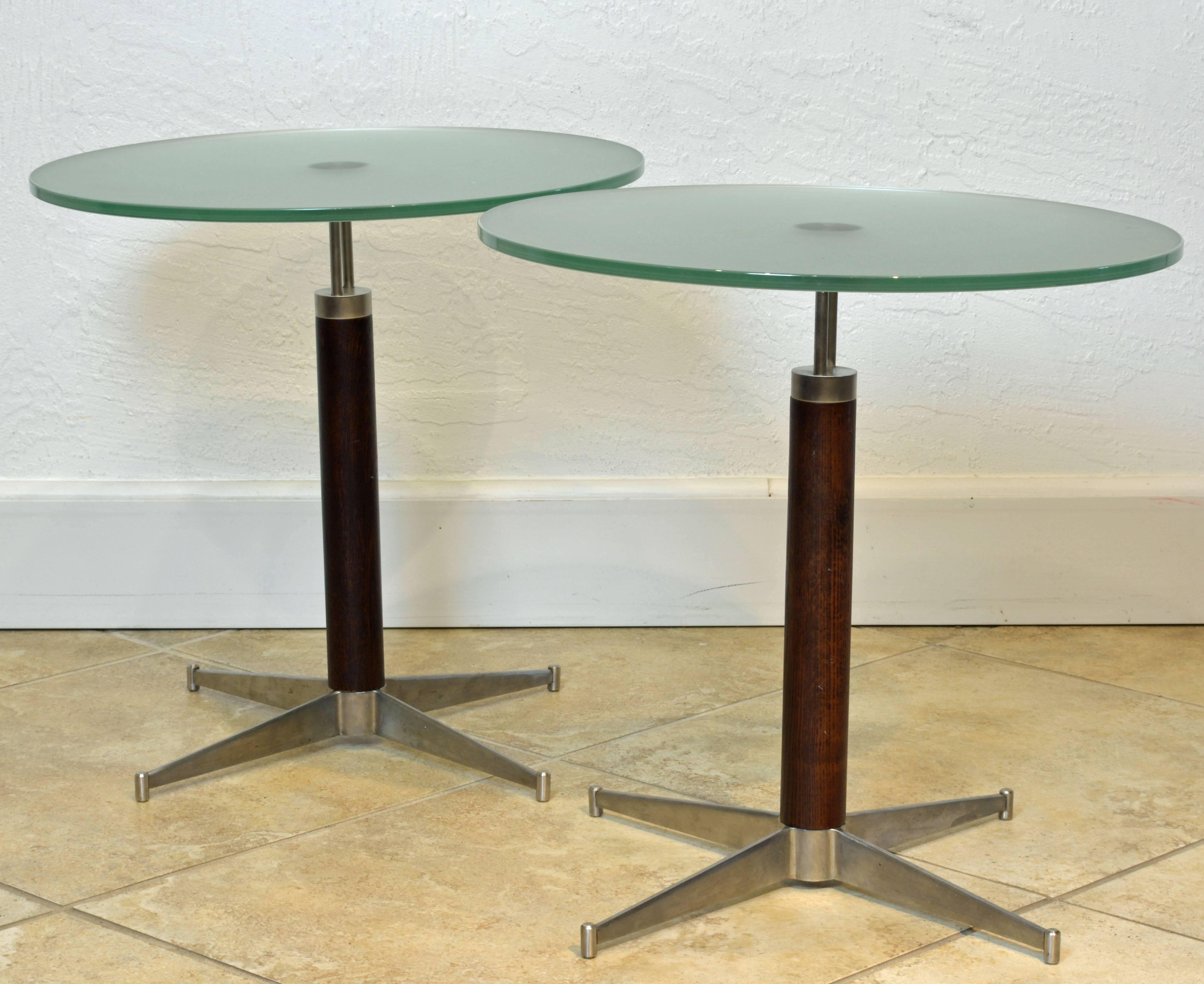 These tables of impeccable craftsmanship and materials feature the modern Minimalist design typical of Arne Jacobsen and other Mid-Century designers. The frosted glass tops lend a special updated quality to the look.
