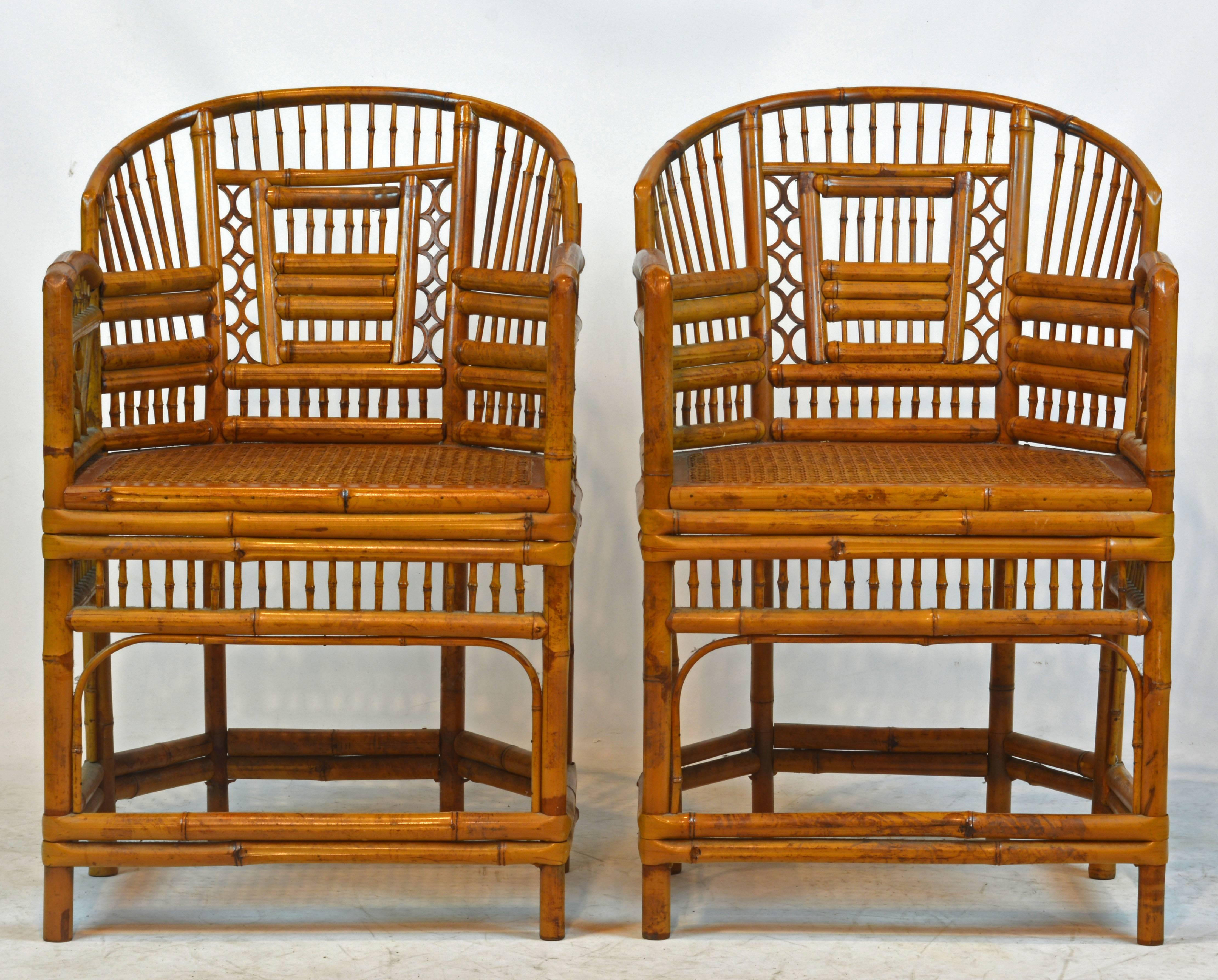 Rising on six legs these intricately crafted chairs with cane seats feature bamboo frames and Chinese inspired bamboo patterns inspired by Chippendale design.