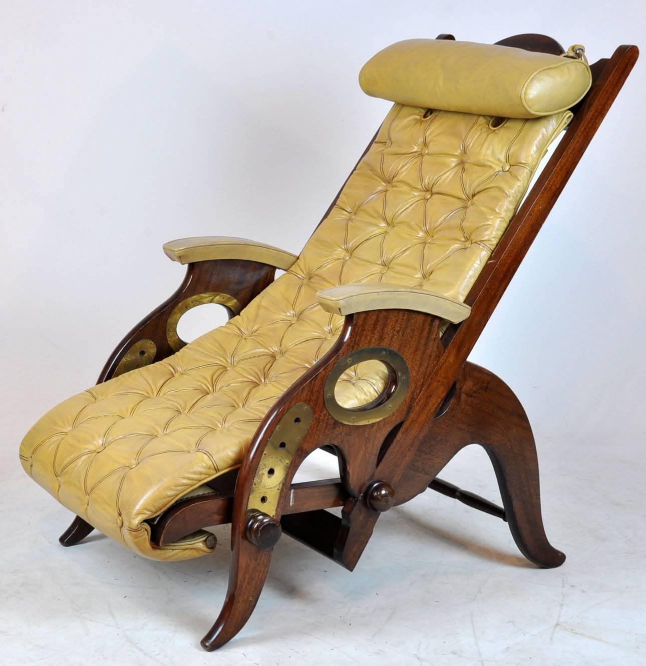 Adjustable brass and wood yacht deck chair. Possibly designed by Jean-Pierre Hagnauer based on what I have found in researching the chair.