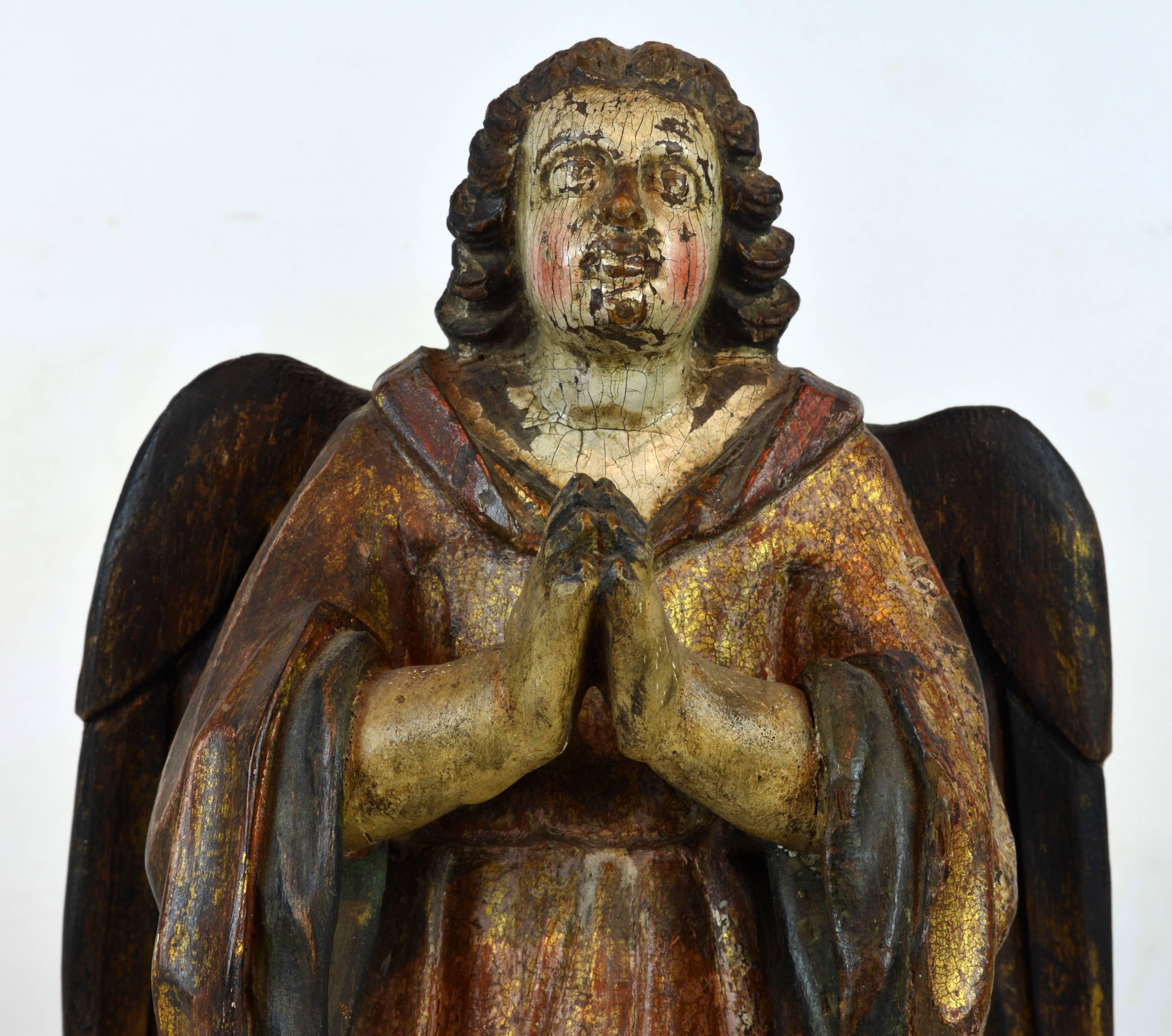 Wood Fine Pair of Early Spanish Colonial Carved Paint and Parcel Gilt Angels