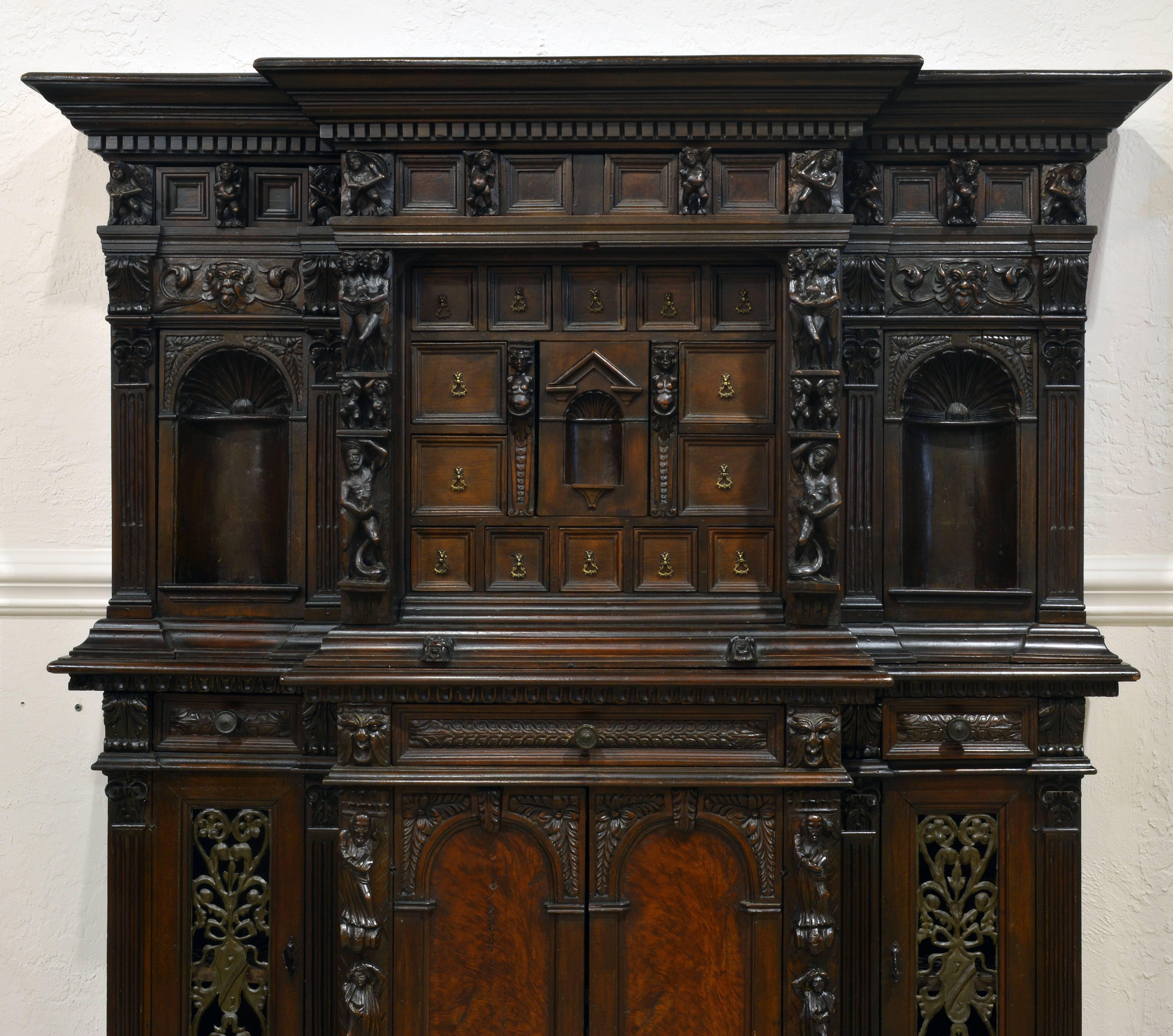 This palatial type of furniture originates in Genoa during the Renaissance in the 16th century. Originally a figurally carved fall front writing cabinet called a Stipo a bambocci, the bambocci being the high relief carved religious and secular