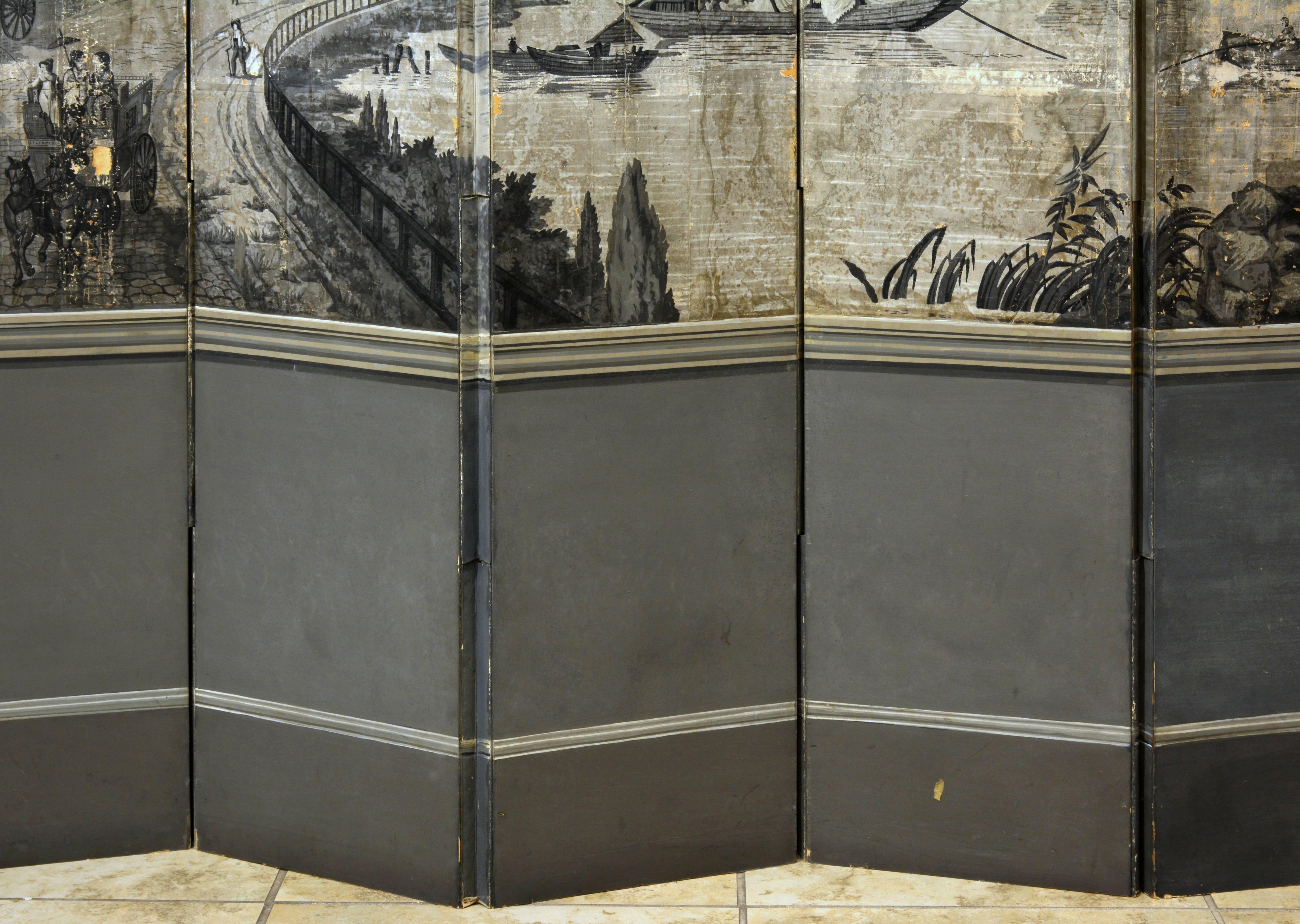 Standing 95.5 inches tall this fine French wall screen features a panoramic landscape with mansions, houses, river, horse carriages etc. The bottom part is painted in a three dimensional way to simulate panels. The back of the screen is painted