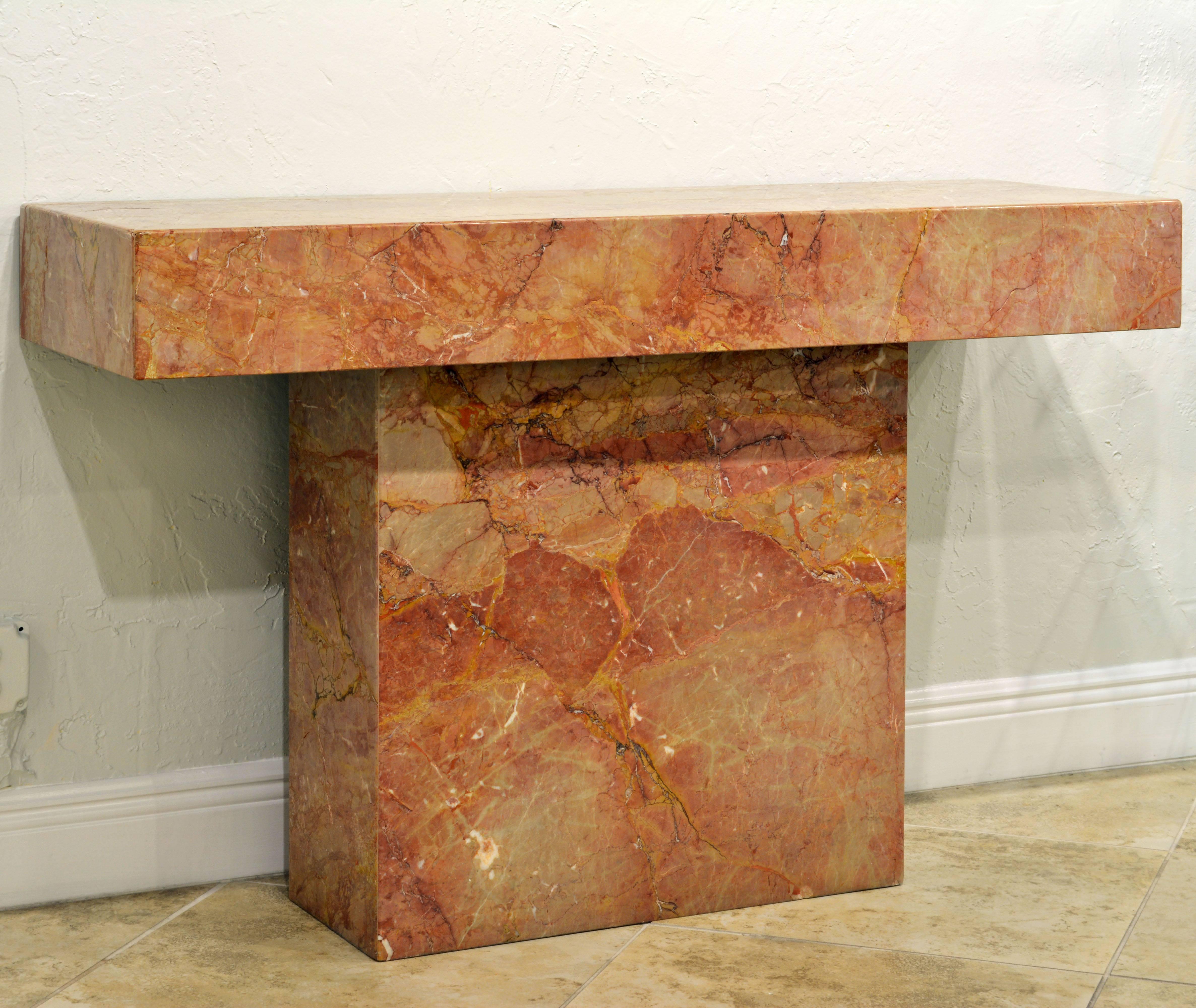 Finished on both sides this console can also be used freestanding. Like a modern cubist sculpture the proportions are harmoniously balanced and the surface offers ever changing views of color and structure.