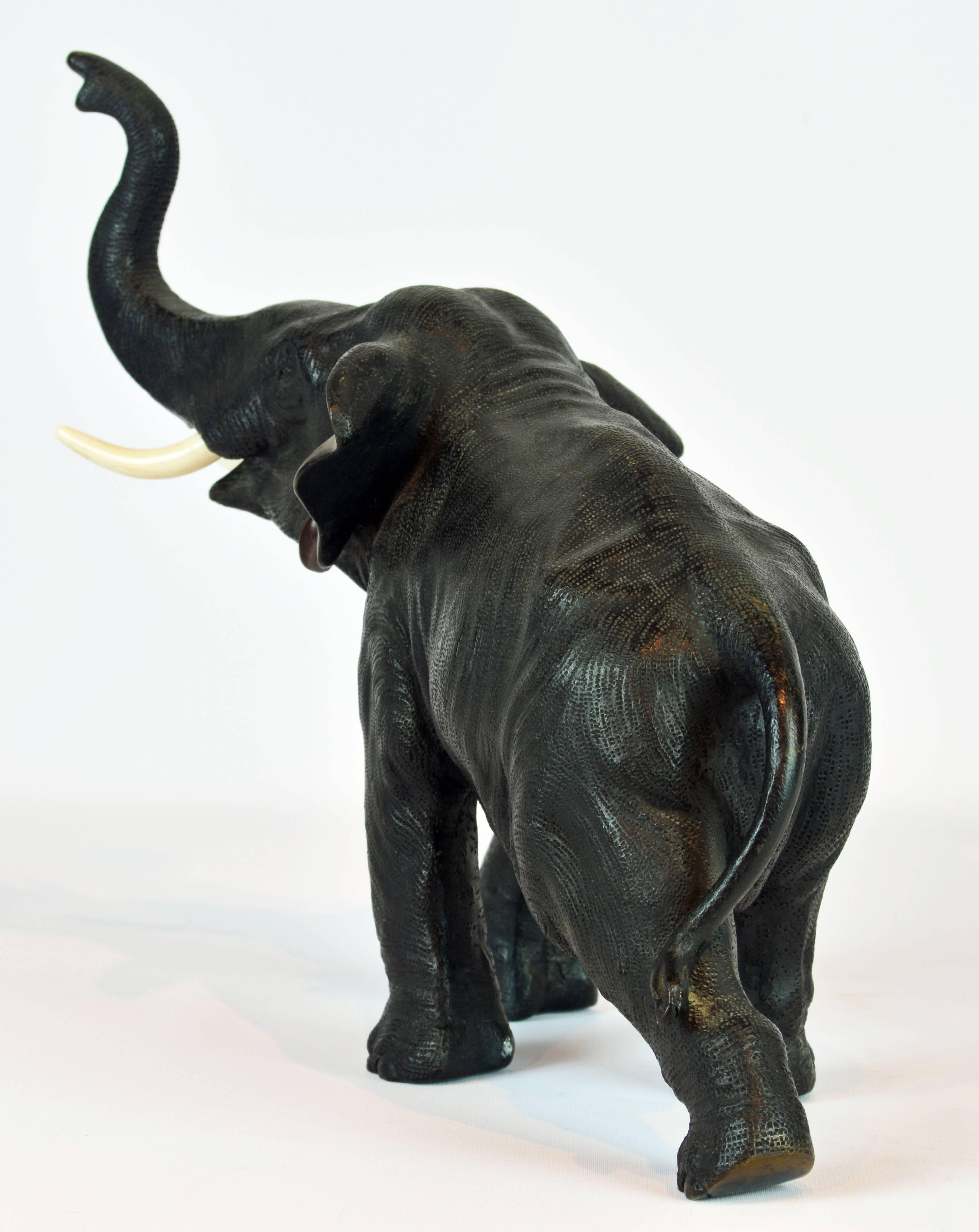 Patinated Large Japanese Mejii Period Bronze Sculpture of an Elephant with Upswung Trunk
