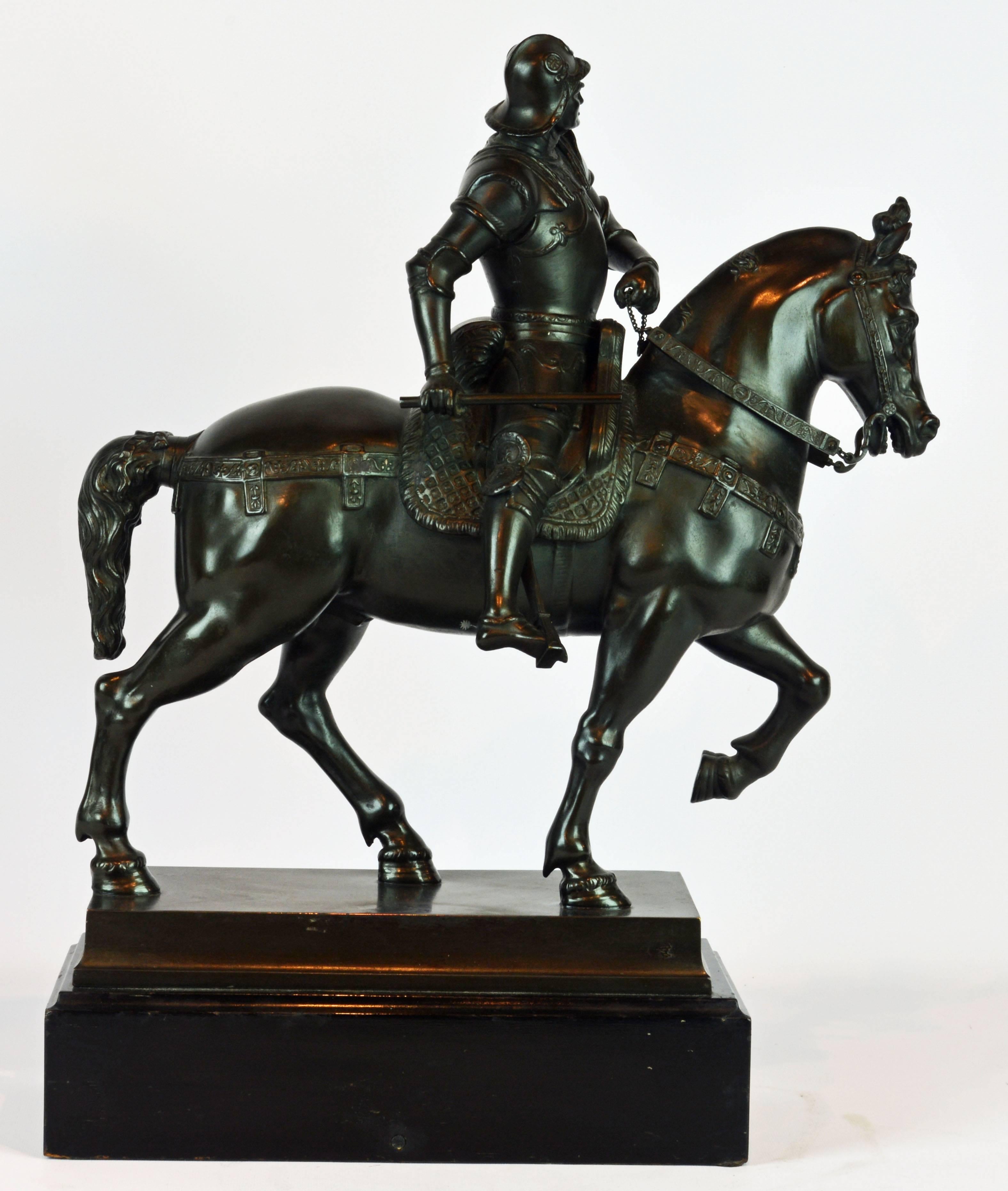 A late 19th century patinated bronze figure after the equestrian statue of Bartolomeo Colleoni by Verrocchio in Venice. Mounted on a wooden ebonized plinth.