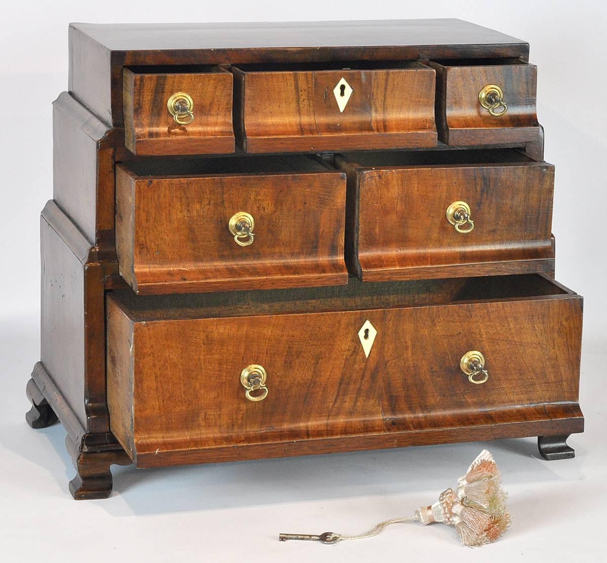 Walnut Chippendale style English miniature chest of drawers, unusual form, circa 1780s.