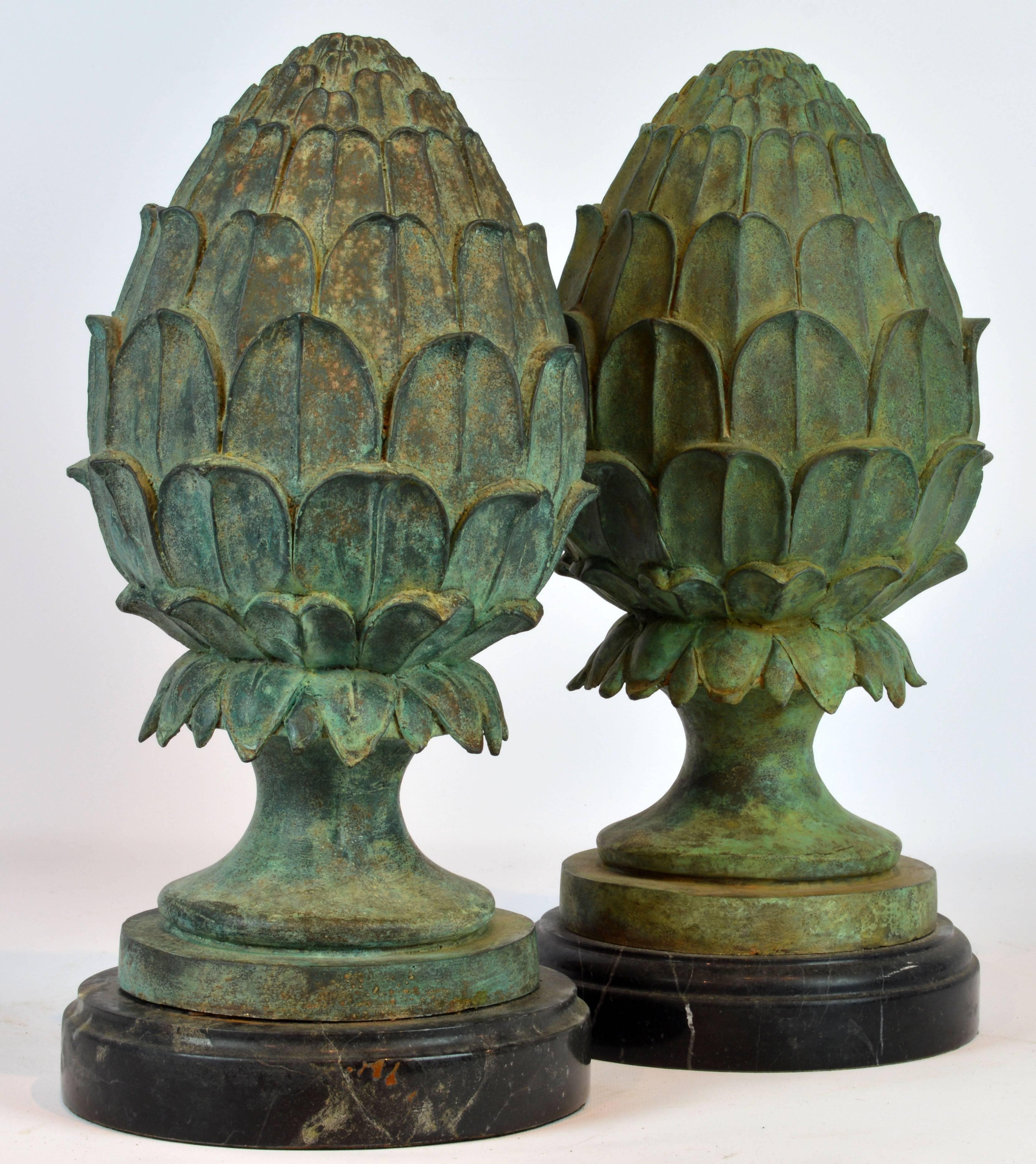 Standing 15 inches tall these beautifully patinated and slightly weathered artichoke sculptures on moulded black marble bases are great both indoors and outdoors adding a classical touch to the decor.