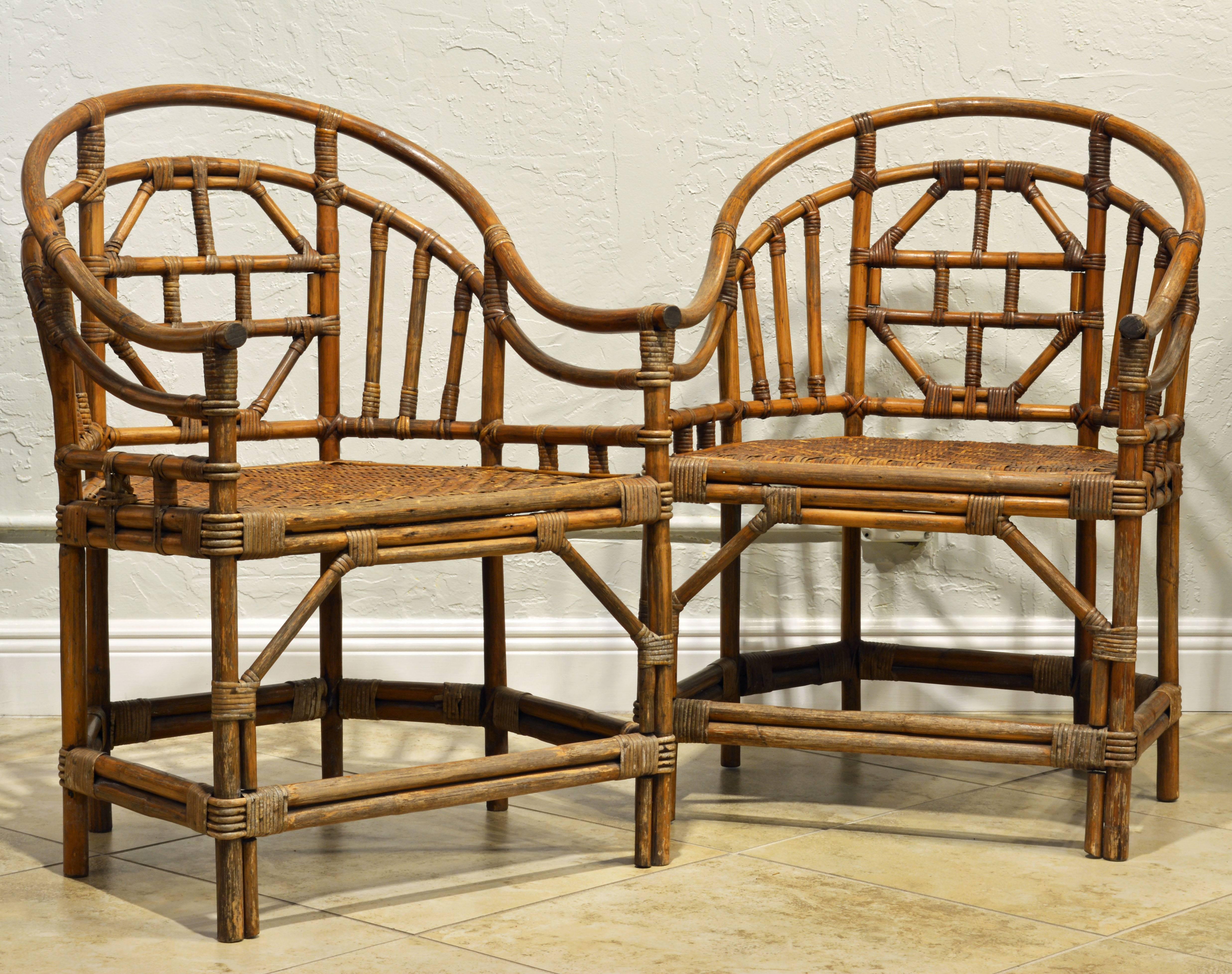 These decorative vintage chairs continue the horse shoe back form of the Ming Dynasty translated into a European influenced Chippendale style bamboo or rattan design. Extremely well made and sturdy with woven cane seats the chairs come with