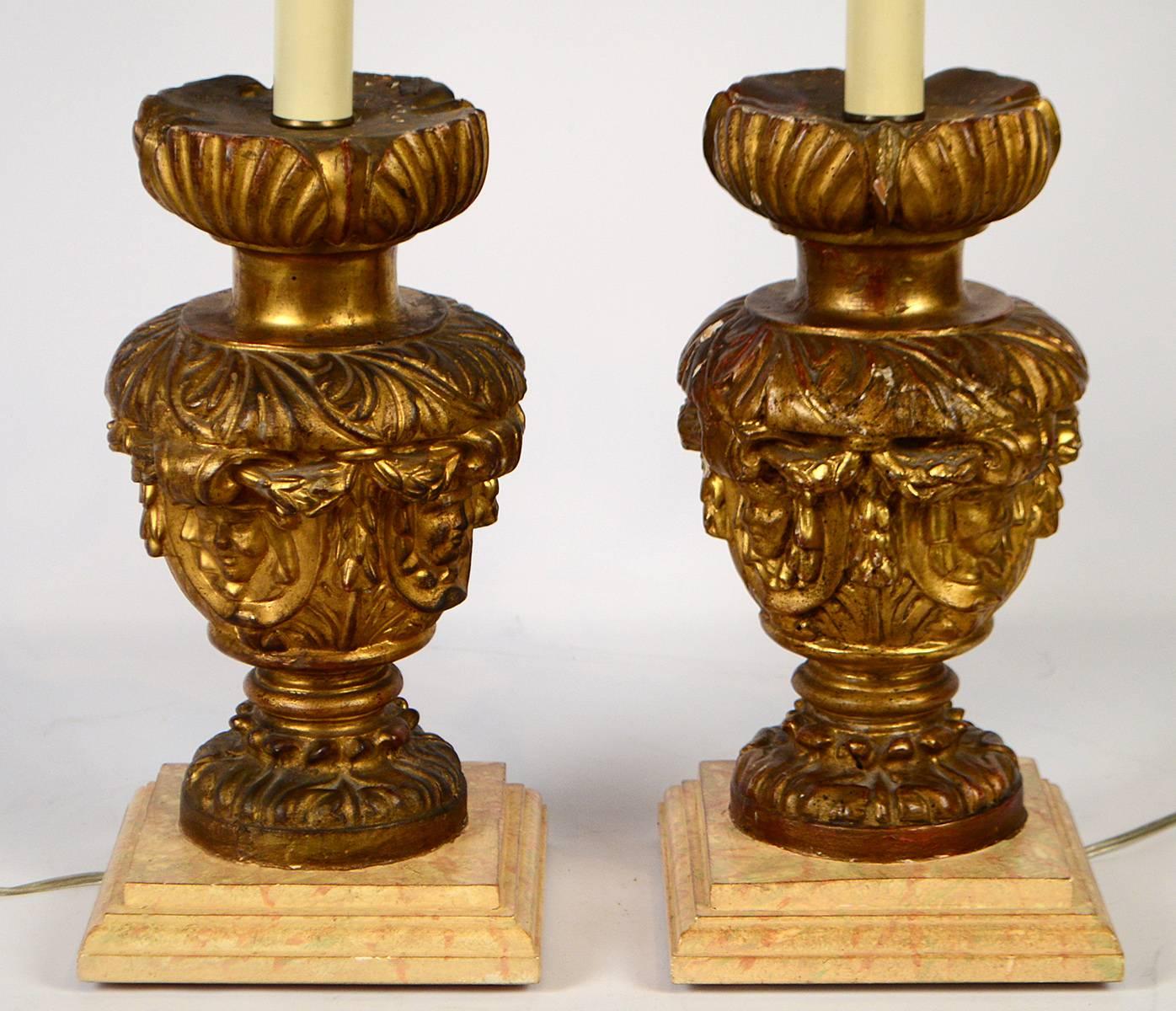 Pair of giltwood lamps. Italian carved wood, 18th-19th century. Faux bases. Good condition based on age.