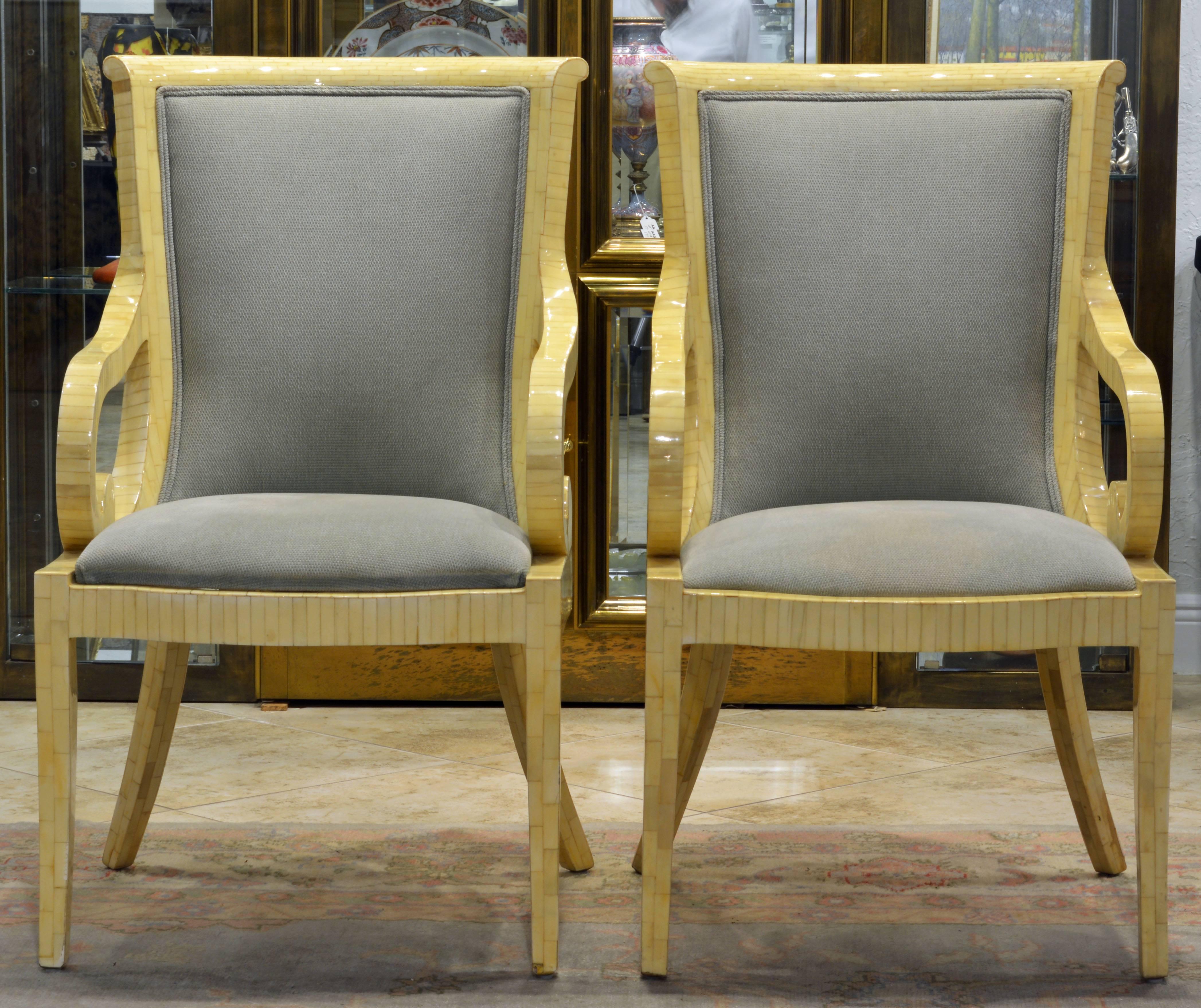 These comfortable chairs feature a sharp neoclassical design in a Mid-Century Modern version designed by Enrique Garcia in the 1970s. The frames are covered with an intricate mosaic of bone overall in great condition and of a uniquely attractive