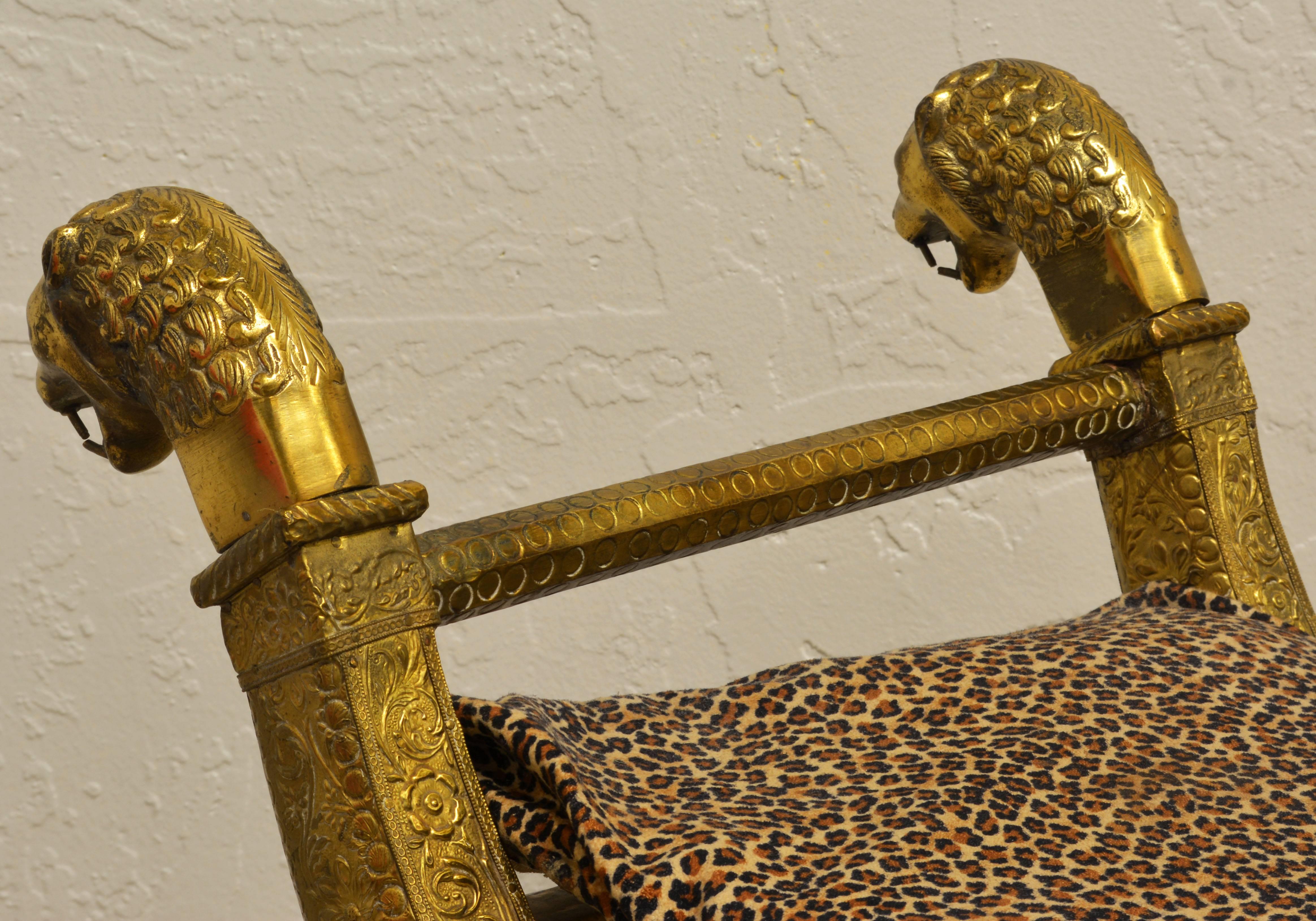 Anglo-Indian Brass Repousse Clad Lion's Head and Paw Feet Curule Bench or Stool In Good Condition In Ft. Lauderdale, FL