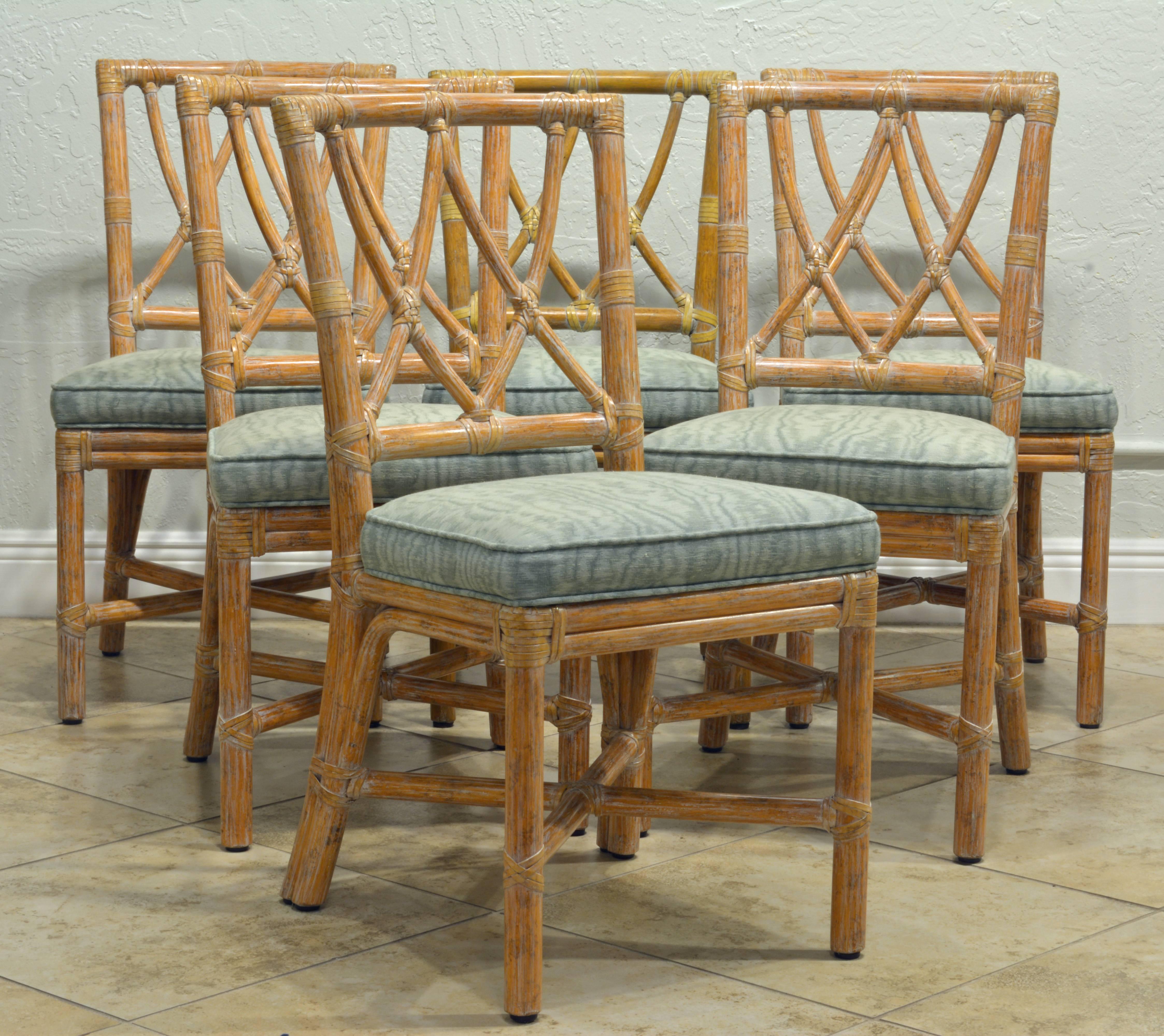 These well constructed chairs combine colonial elegance and tropical flair. The seats are beautifully upholstered and the group of chairs are in excellent condition.