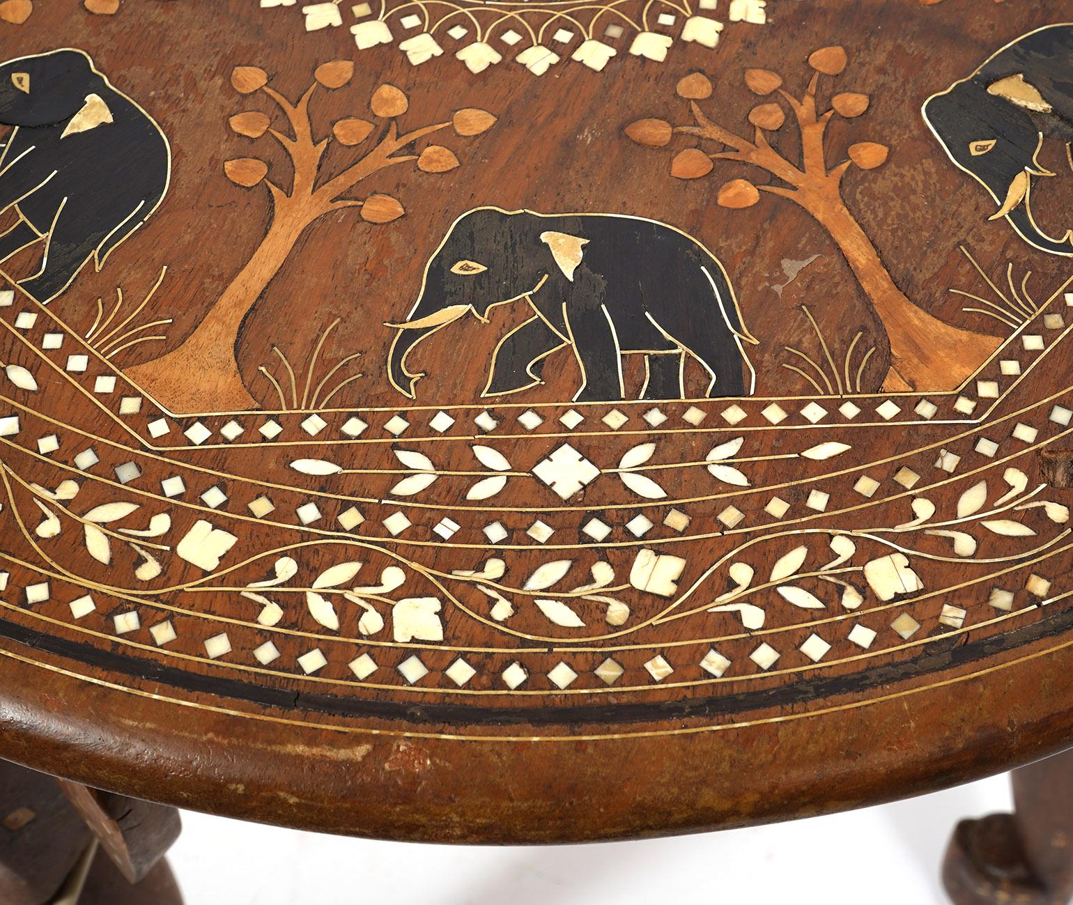 20th Century Early 20th Ct. Anglo Indian Carved Wood and Inlaid Round Elephant Table For Sale
