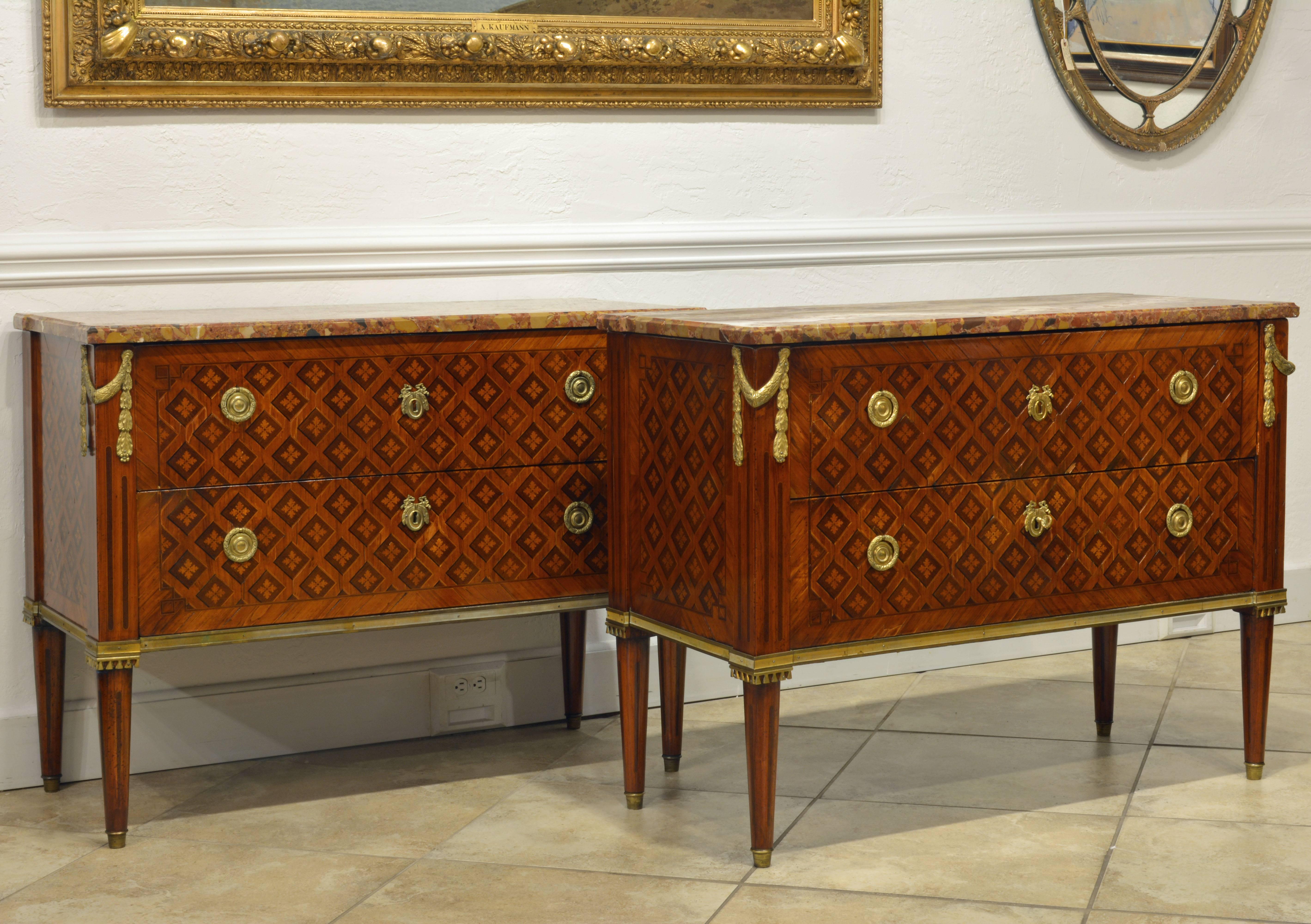 Gilt Pair of 18th Century Louis XVI Ormolu-Mounted Marquetry and Marble Top Commodes