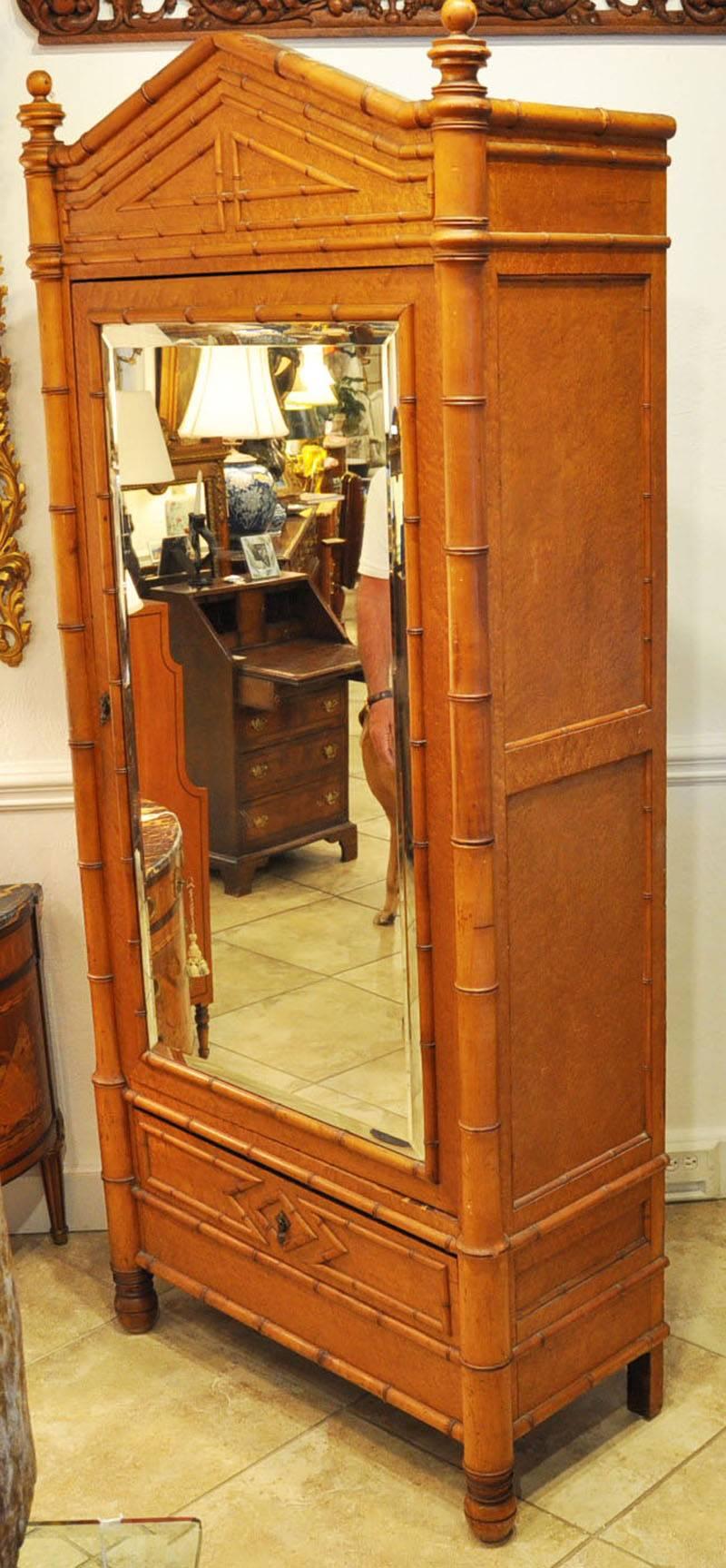 One-door and one-drawer. Mirrored beveled glass front. Cabinet retains lovely color and finish.