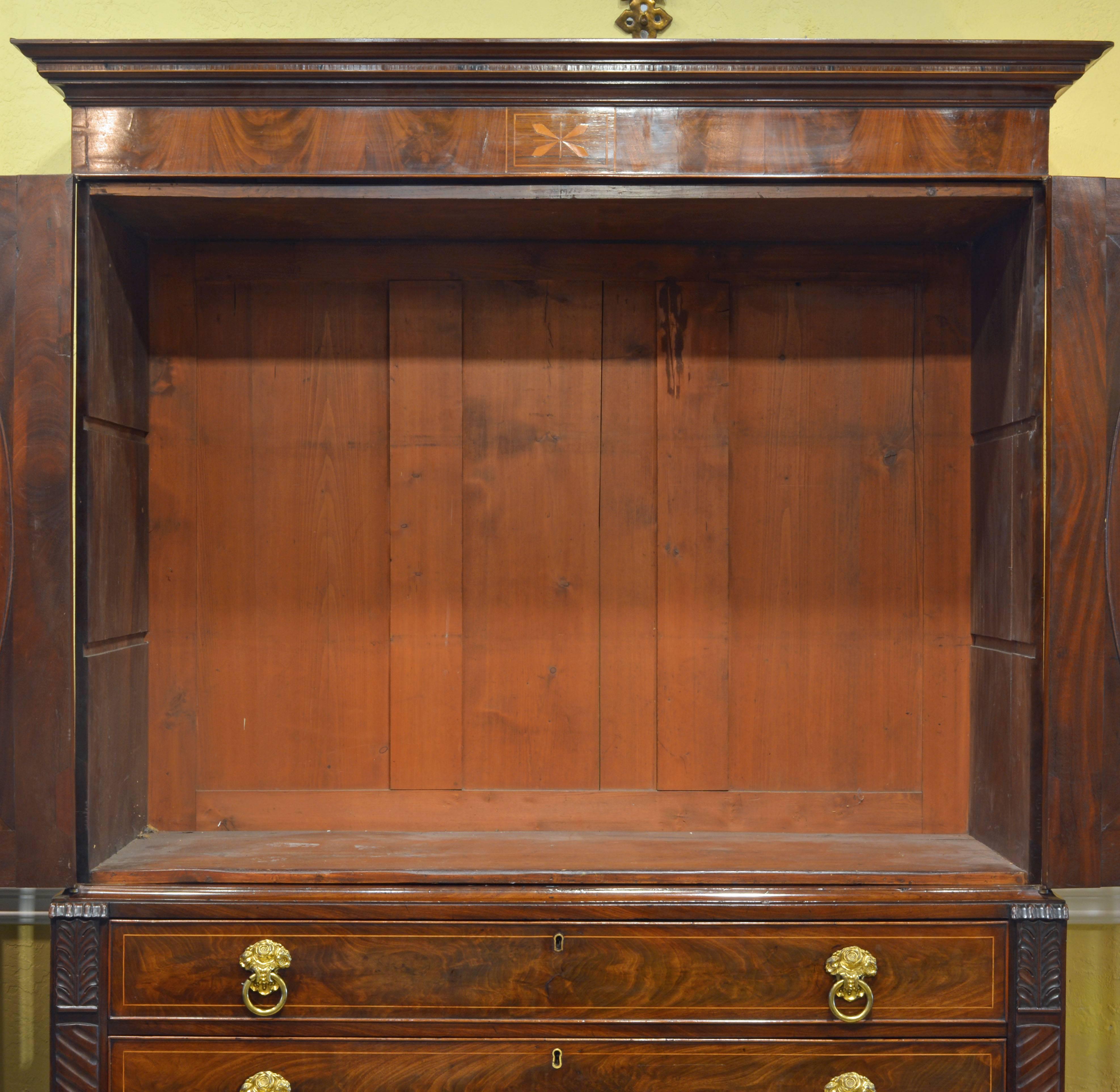 Good English William IV Flame Mahogany Linen Press with Oval Panels and Inlays In Good Condition In Ft. Lauderdale, FL