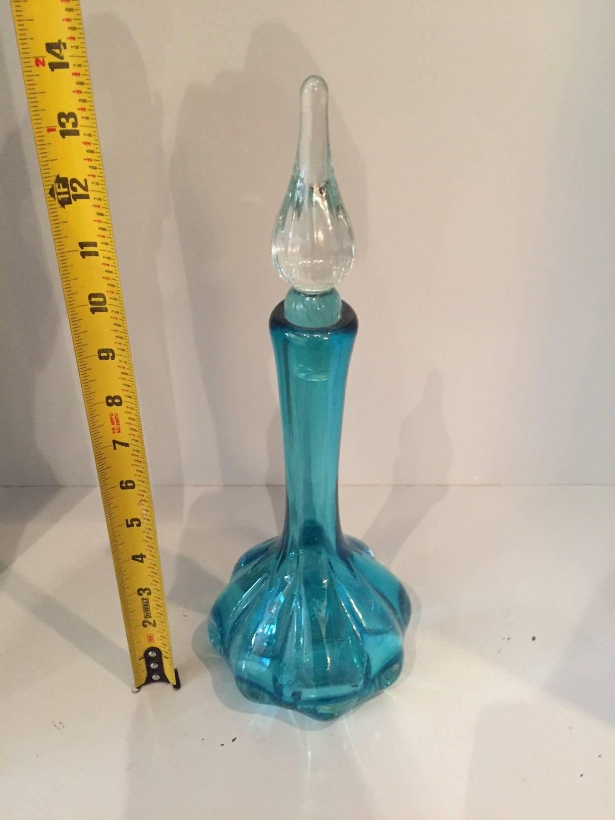Mid-Century aqua vase with clear stopper.
