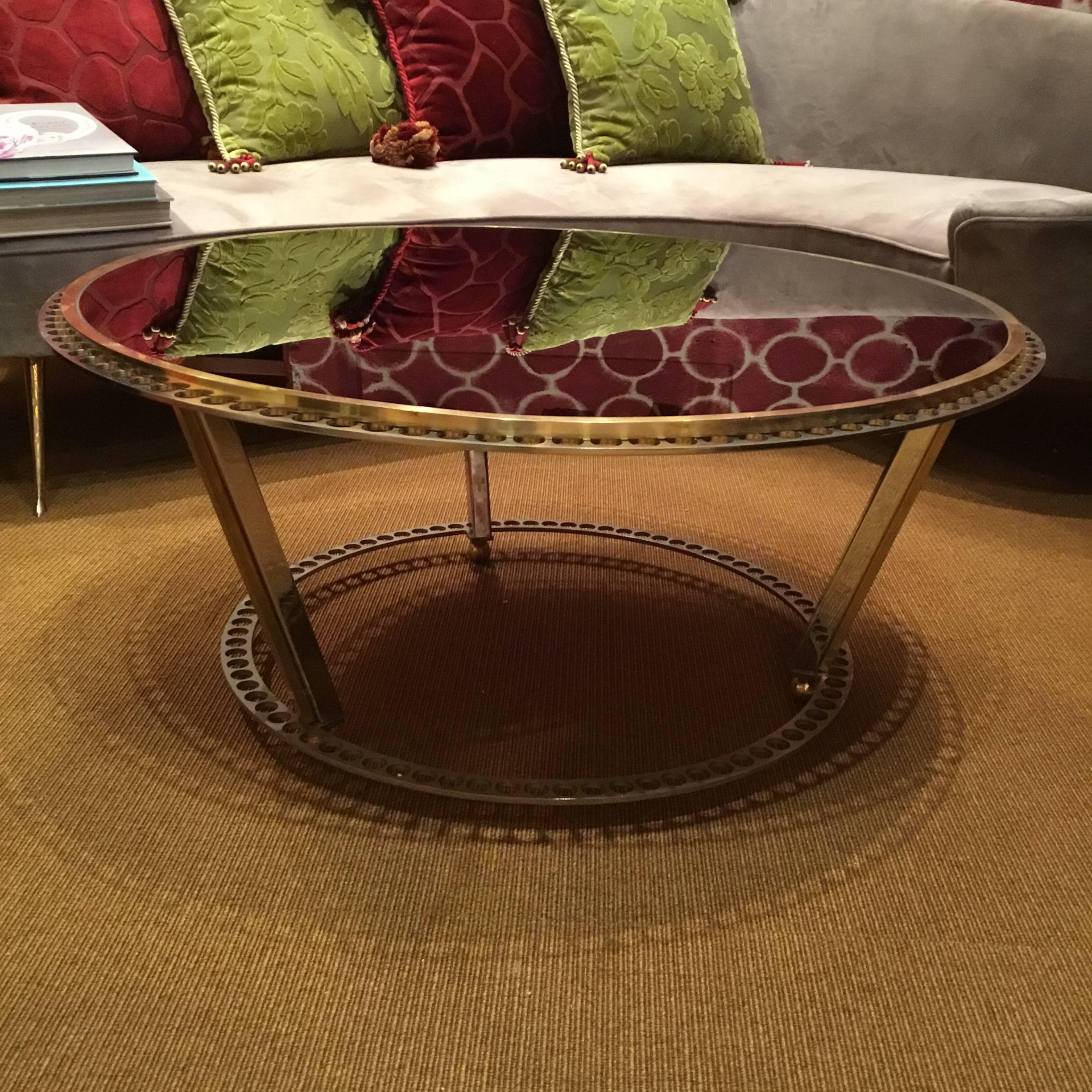 Coffee table with metal structure and black glass top.
made in Italy by a craftman, modern piece 2017