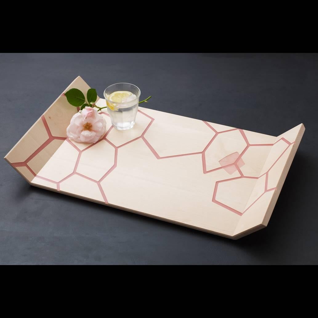 Solid maple serving tray with translucent pink inlaid resin in our honeycomb design. Inspired by repeated forms and patterns found in nature, and breakfast in bed. 

Carved grooves for handles. Handmade in Brooklyn, NY

19.5 x 11.5
