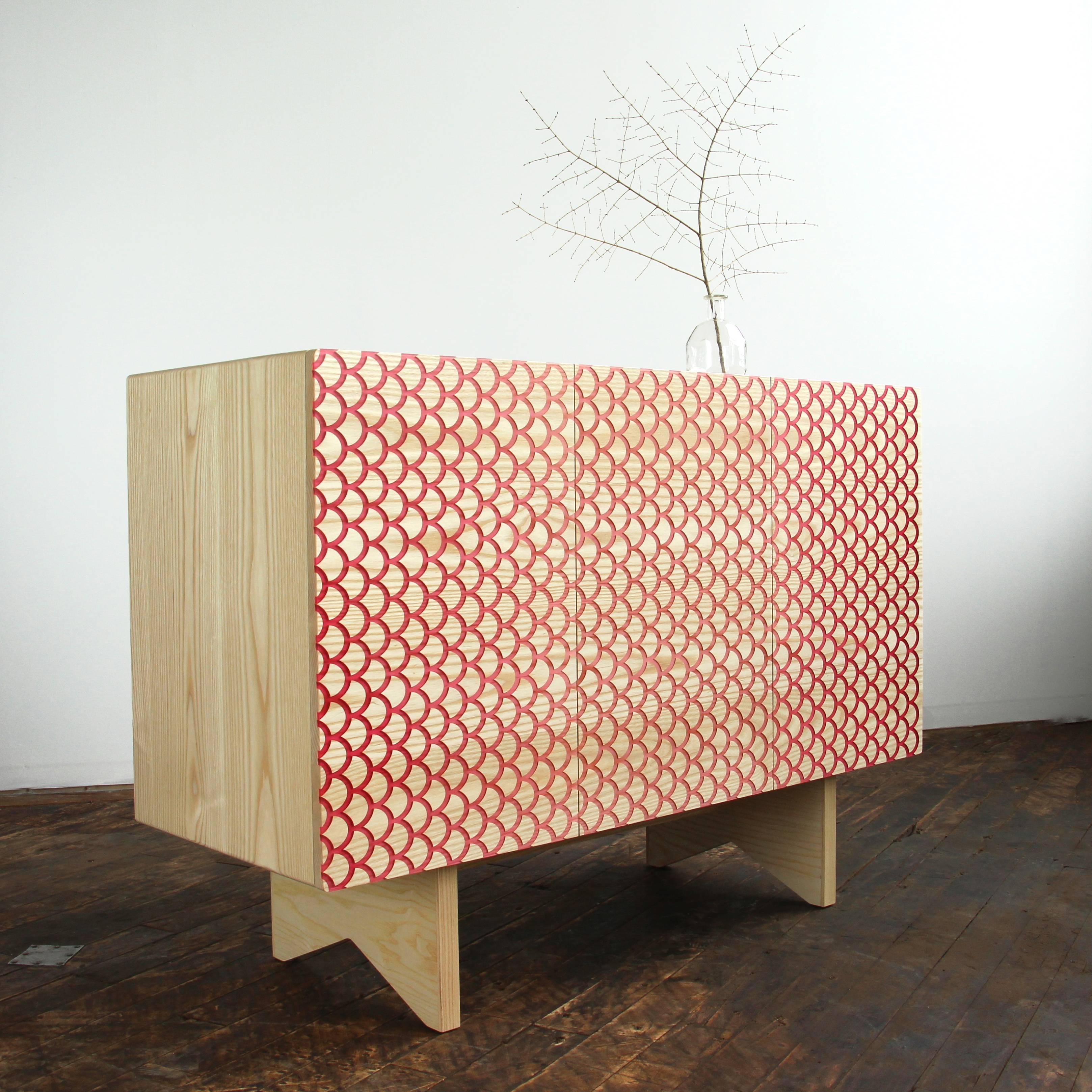 The Koi Credenza by Noble Goods is made from solid ash with inlaid resin. The vivid pattern of inlay, inspired by the undulating scales of Japanese ornamental fish, is activated as you move around the piece. Elegantly proportioned and simply