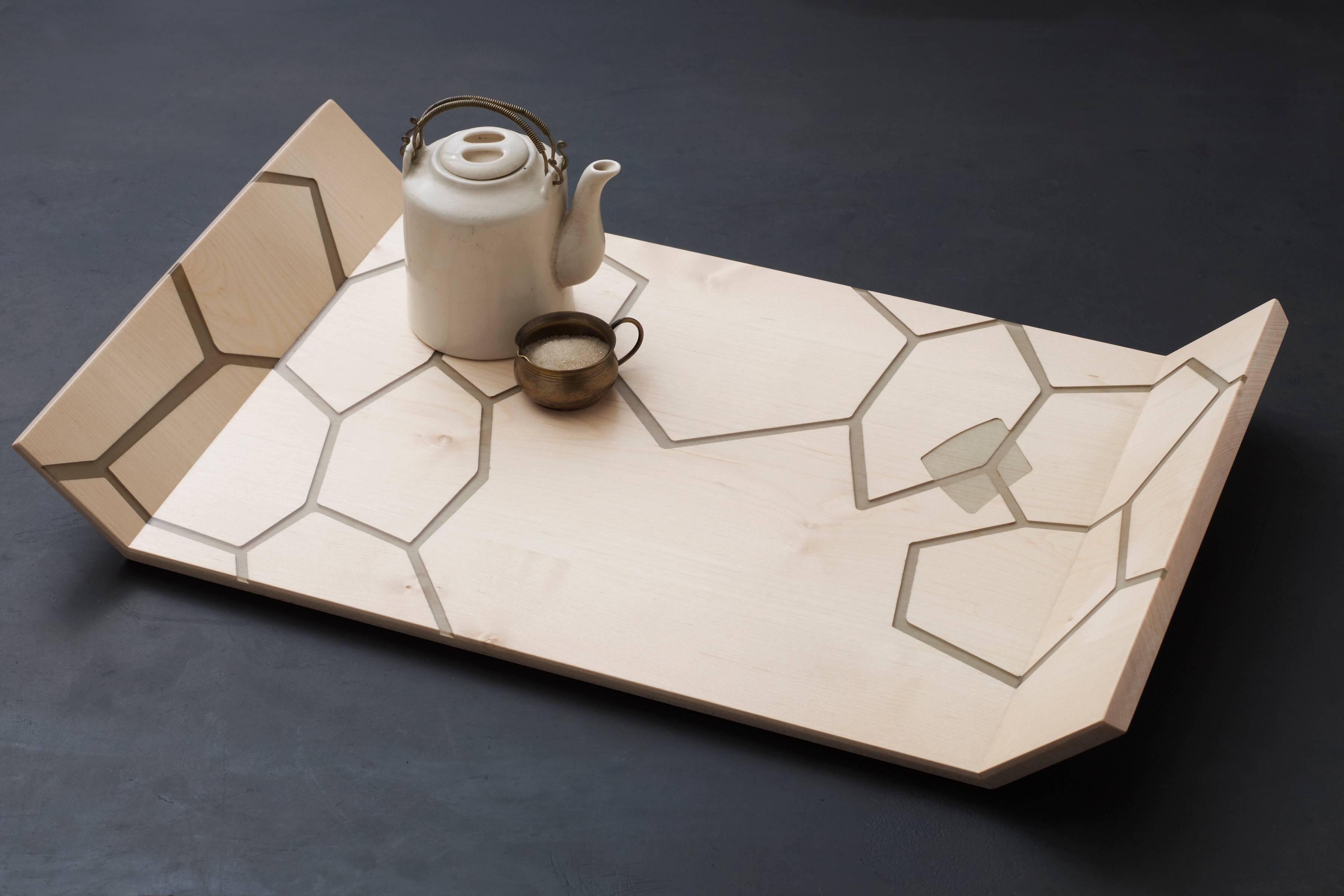 Solid maple serving tray with translucent smoke-colored inlaid resin in our honeycomb design. Inspired by repeated forms and patterns found in nature, and breakfast in bed. 

Carved grooves for handles. Handmade in Brooklyn, NY

19.5 x 11.5