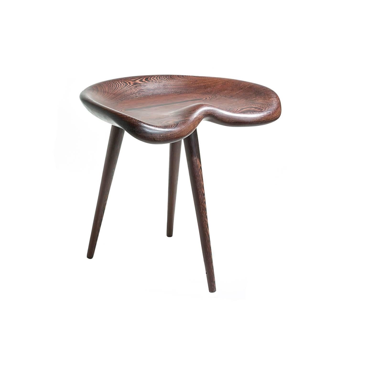 Stingray Stool by Michael Boyd for PLANEfurniture, offered here in Wenge with an oil finish. From the WEDGE series. 

The Wedge series has a softer, more traditional character and may see wider distribution as a result. Slatted lounge chairs,