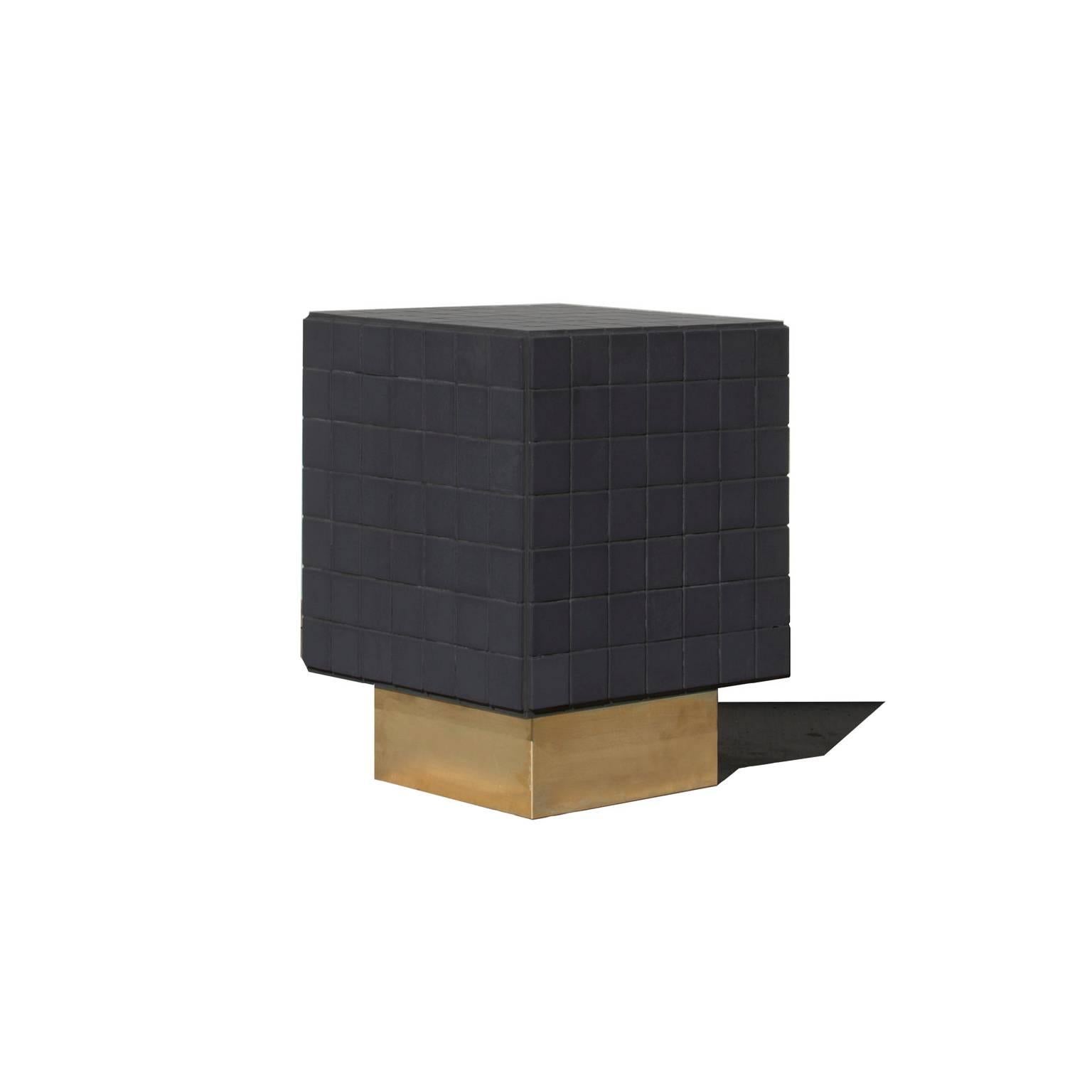 BT III tiled side table in ceramic and brass by Nima Abili

An elegant modern side coffee table in concrete, brass, and matte black ceramic tile. 

As the line between fine art and design becomes increasingly blurred, Nima Abili stands somewhere in
