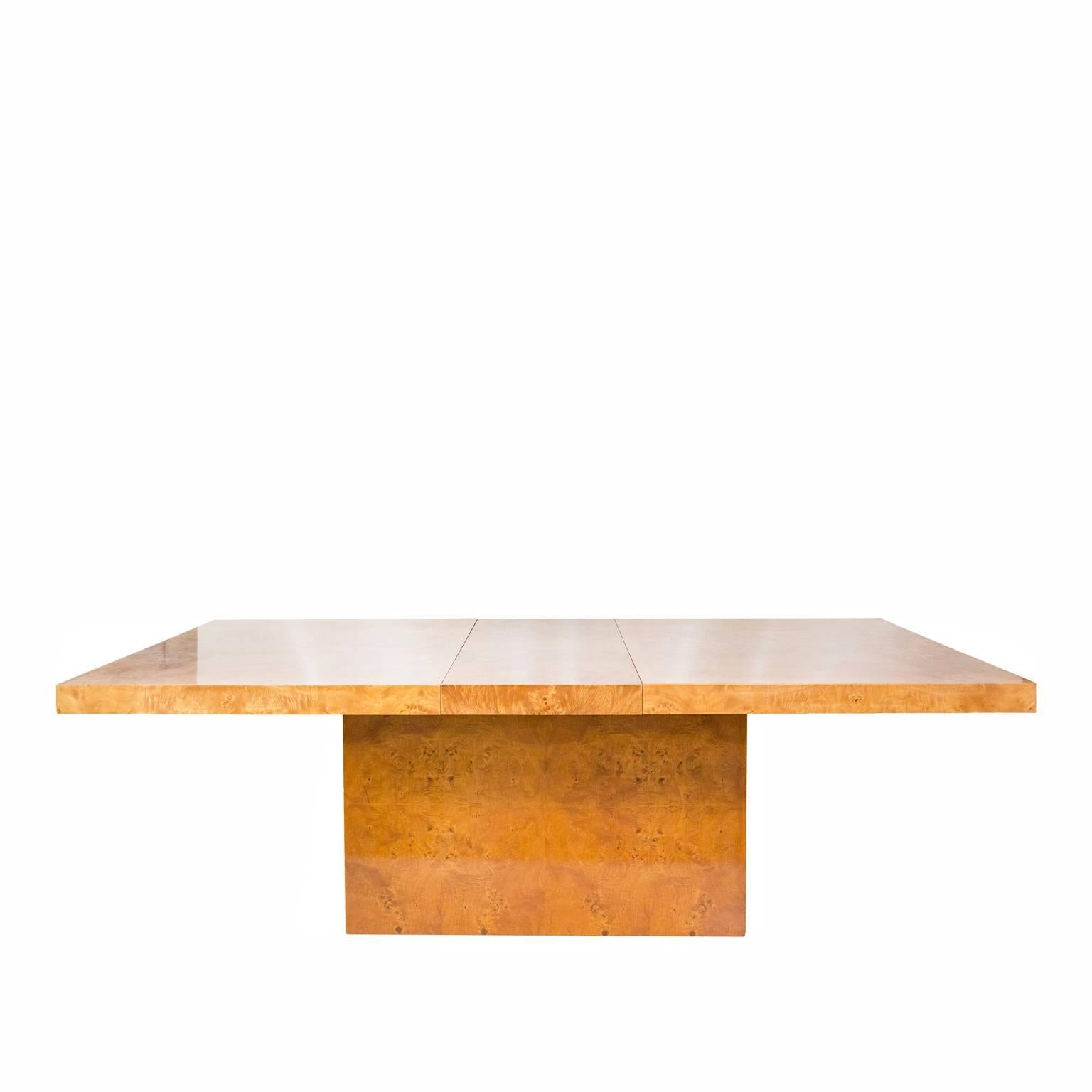 Milo Baughman burl wood dining table. Made of burled olive wood, this gorgeous piece extends via a pair of 18