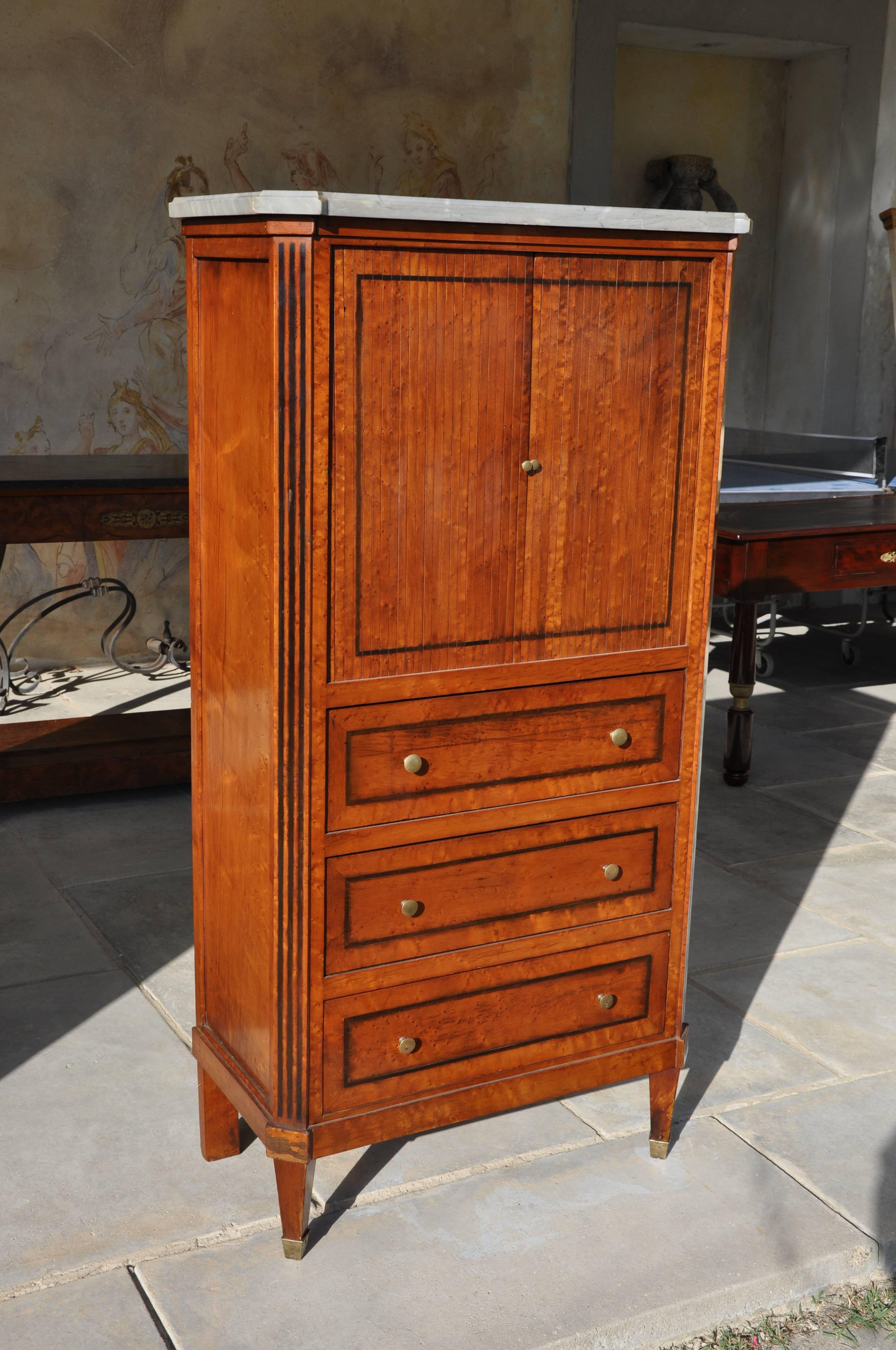 Walnut cabinet with top in Belgian grey marble. The upper part has an unusual opening with shutters, while the bottom part has three drawers. It was made in 19th century, circa 1800-1820
Size 75 x 39cm, height 144 cm.