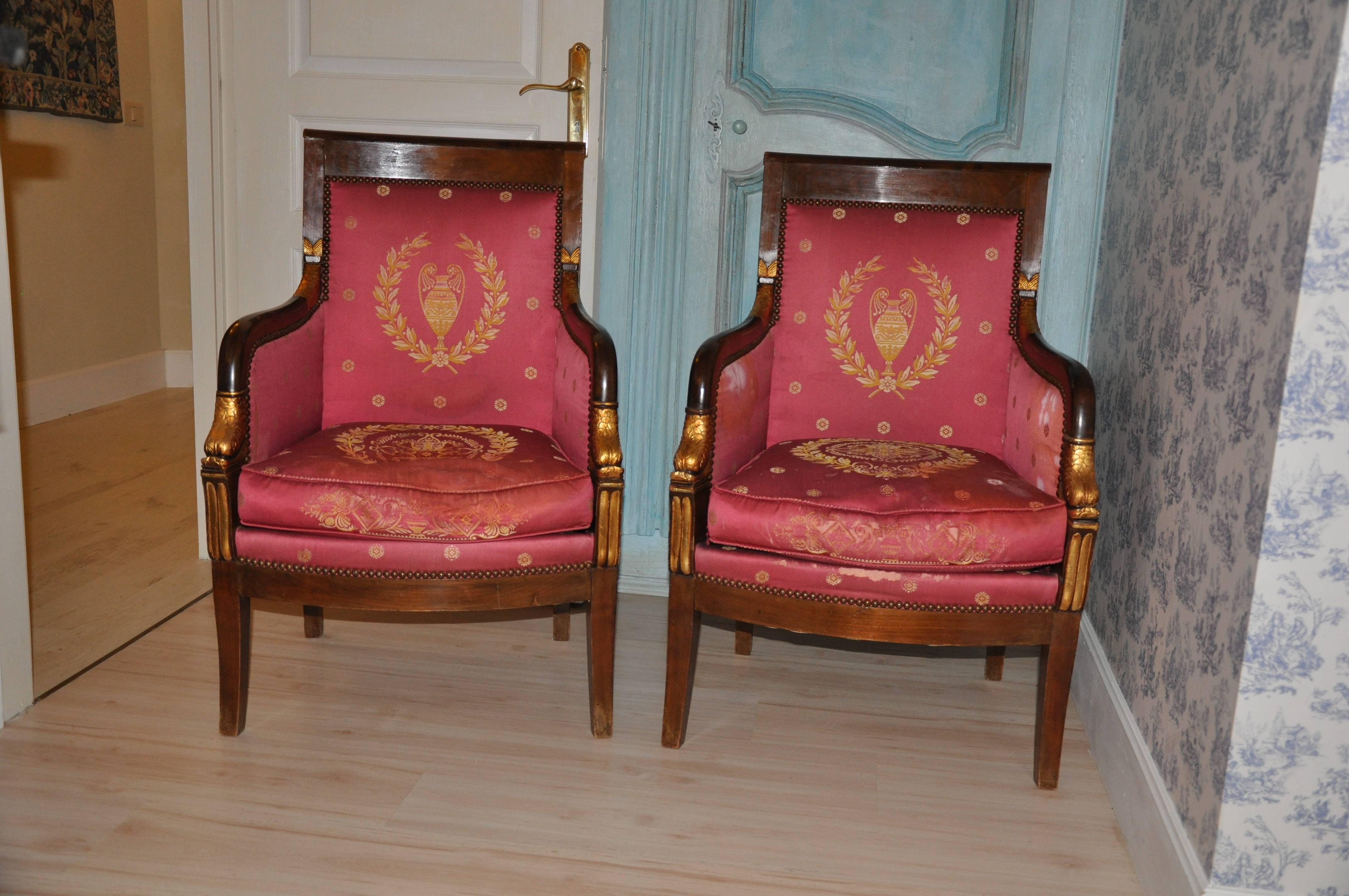 Rare pair of Italian Empire armchairs from Lucca. The period is around the beginning of the 19th century (1800). The armchairs are ornamented with gold-plated leaf pieces. They are to be restored.
