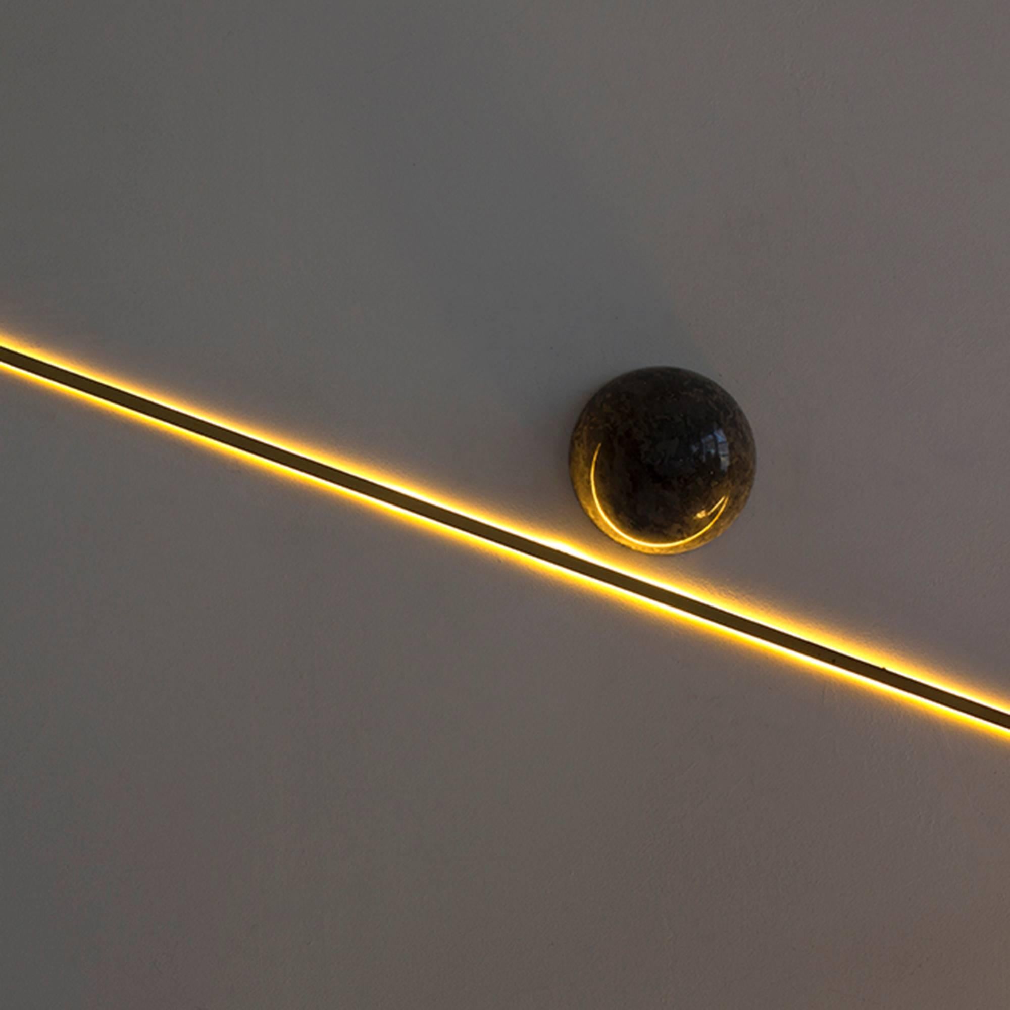 Falling Star Led Wall Lamp in Brass with a Black Marble Base 1